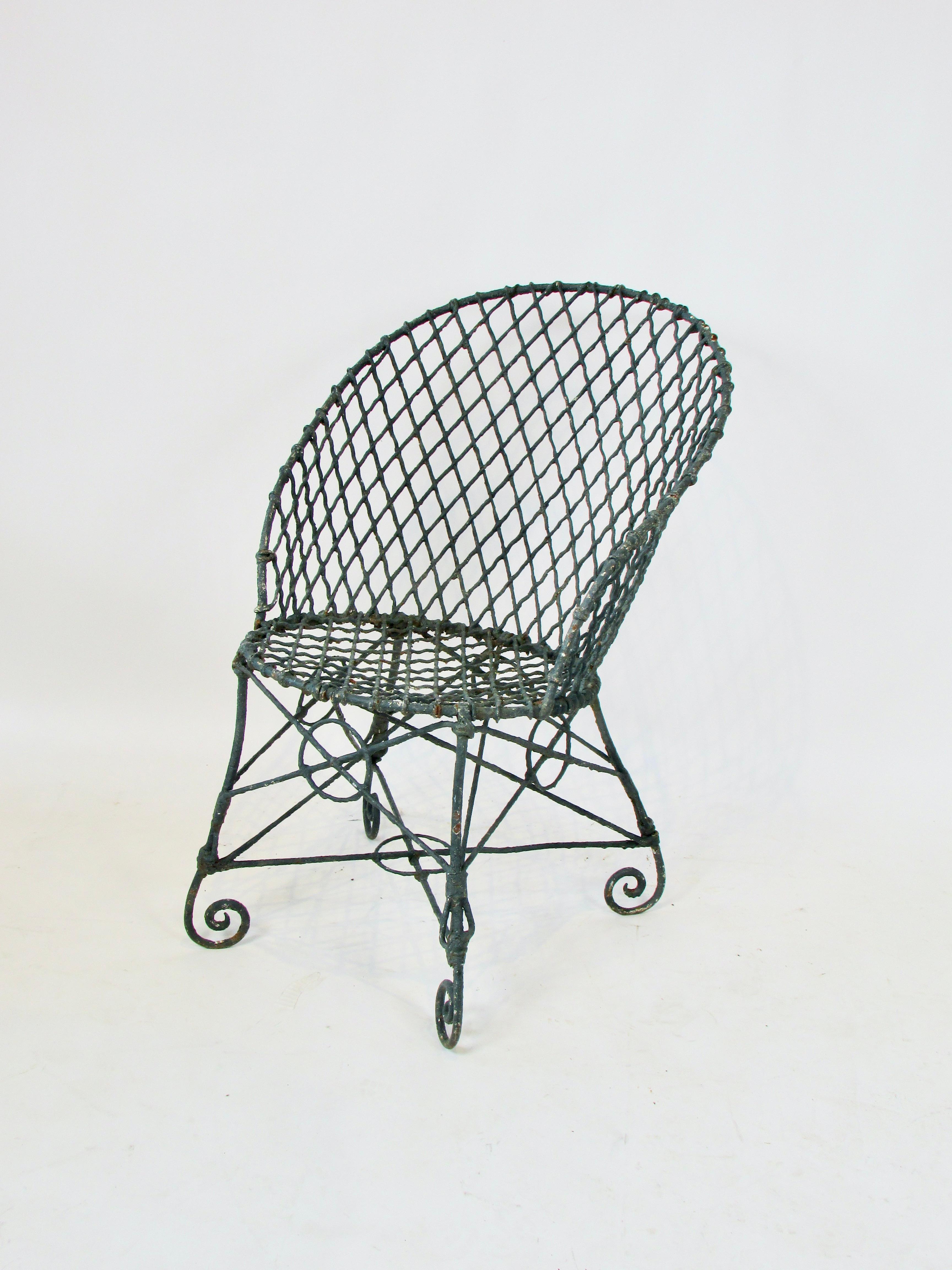 Early 20th Century wire garden chair in old paint and patina In Good Condition In Ferndale, MI