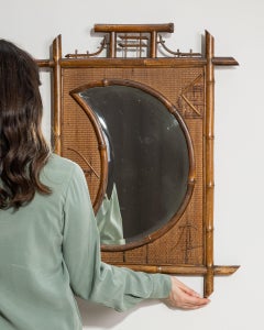 Early 20th Century Wood Faux Bamboo Crescent Mirror With Rattan Inlay