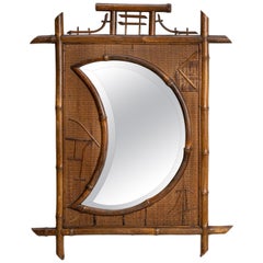 Early 20th Century Wood Faux Bamboo Crescent Mirror With Rattan Inlay