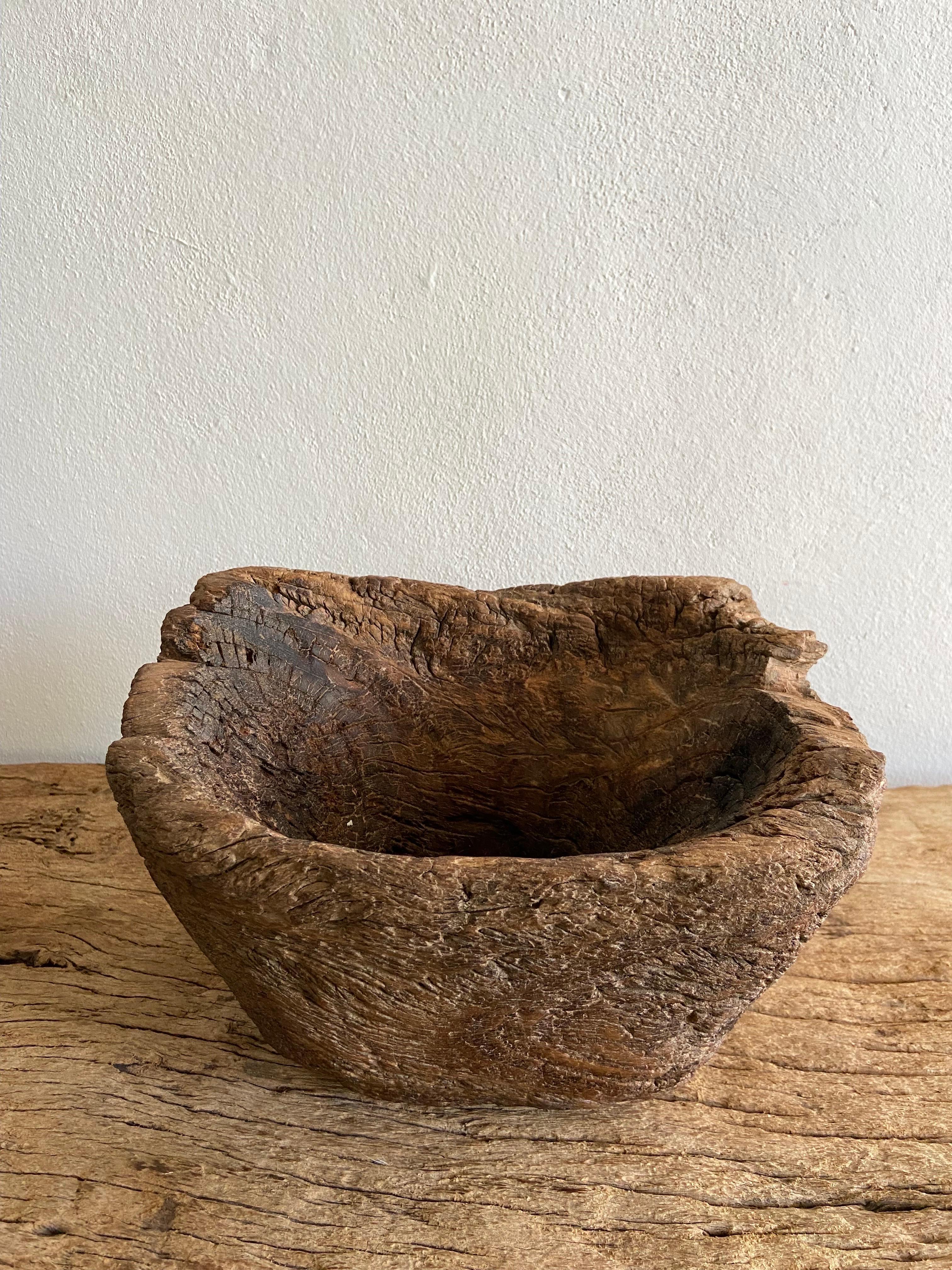 Early 20th century wood mortar from Veracruz, Mexico. Originally used to grind coffee, the unusual aspect of this mortar is its size. Wood mortars typically start at 16