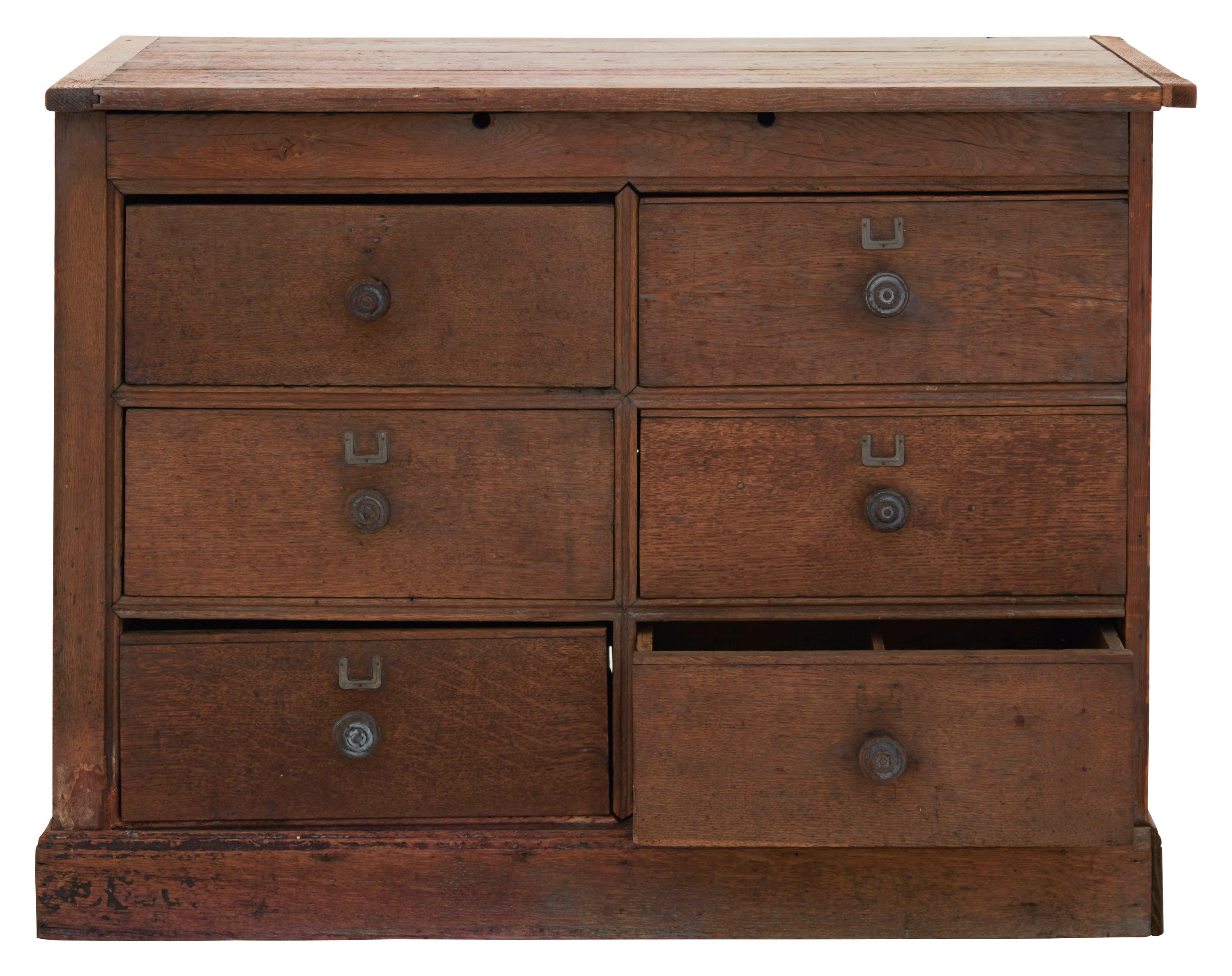 • Patinated wood finish
• Hand turned wood knobs
• Early 20th century
• France
• Measures: 43