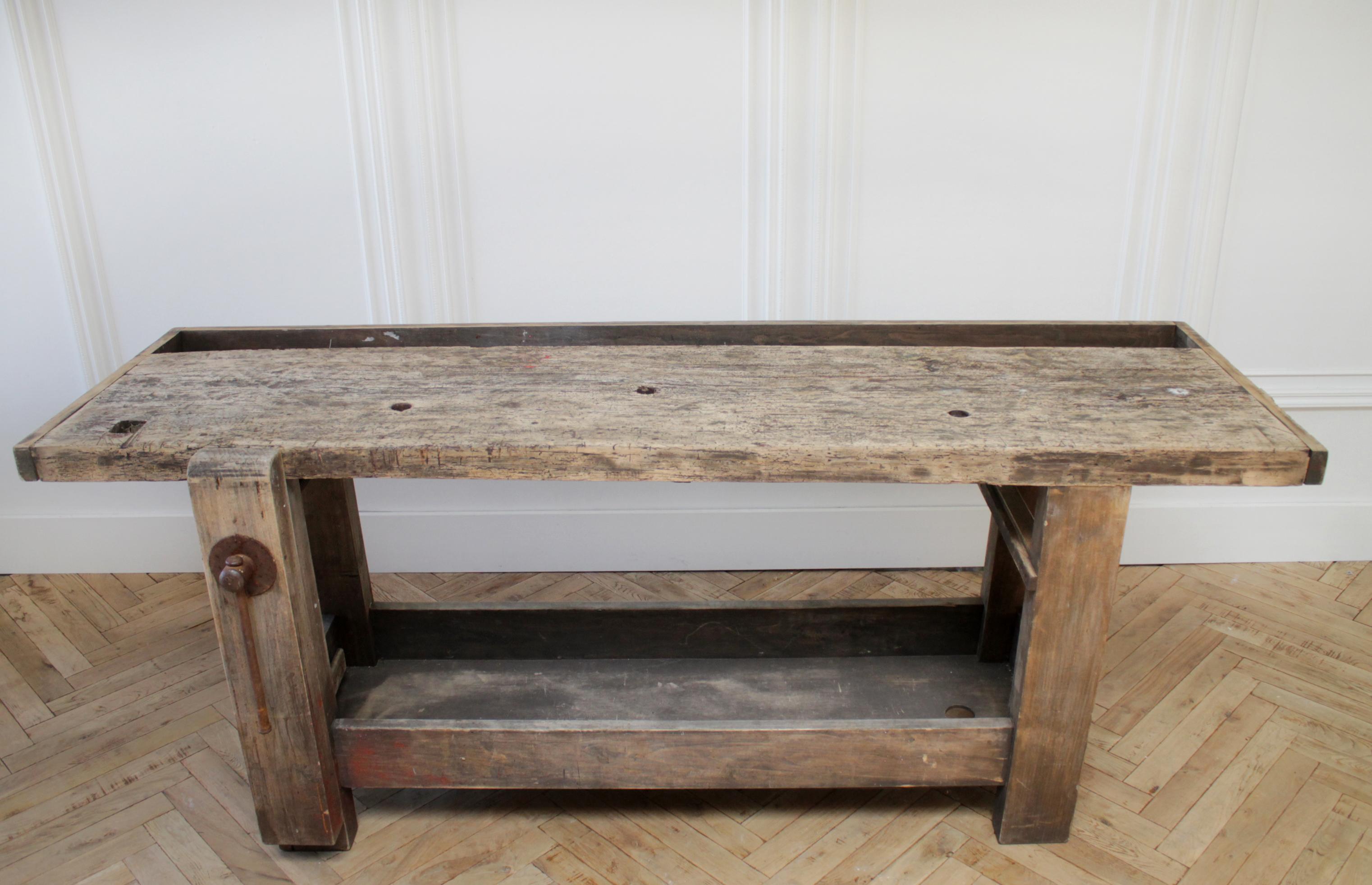 19th-20th century work console table with original hardware
This is a beautiful work table with lots of character. The wood is distressed, with light and dark tones. Very solid and sturdy, this would work great as an entry table, console table, or