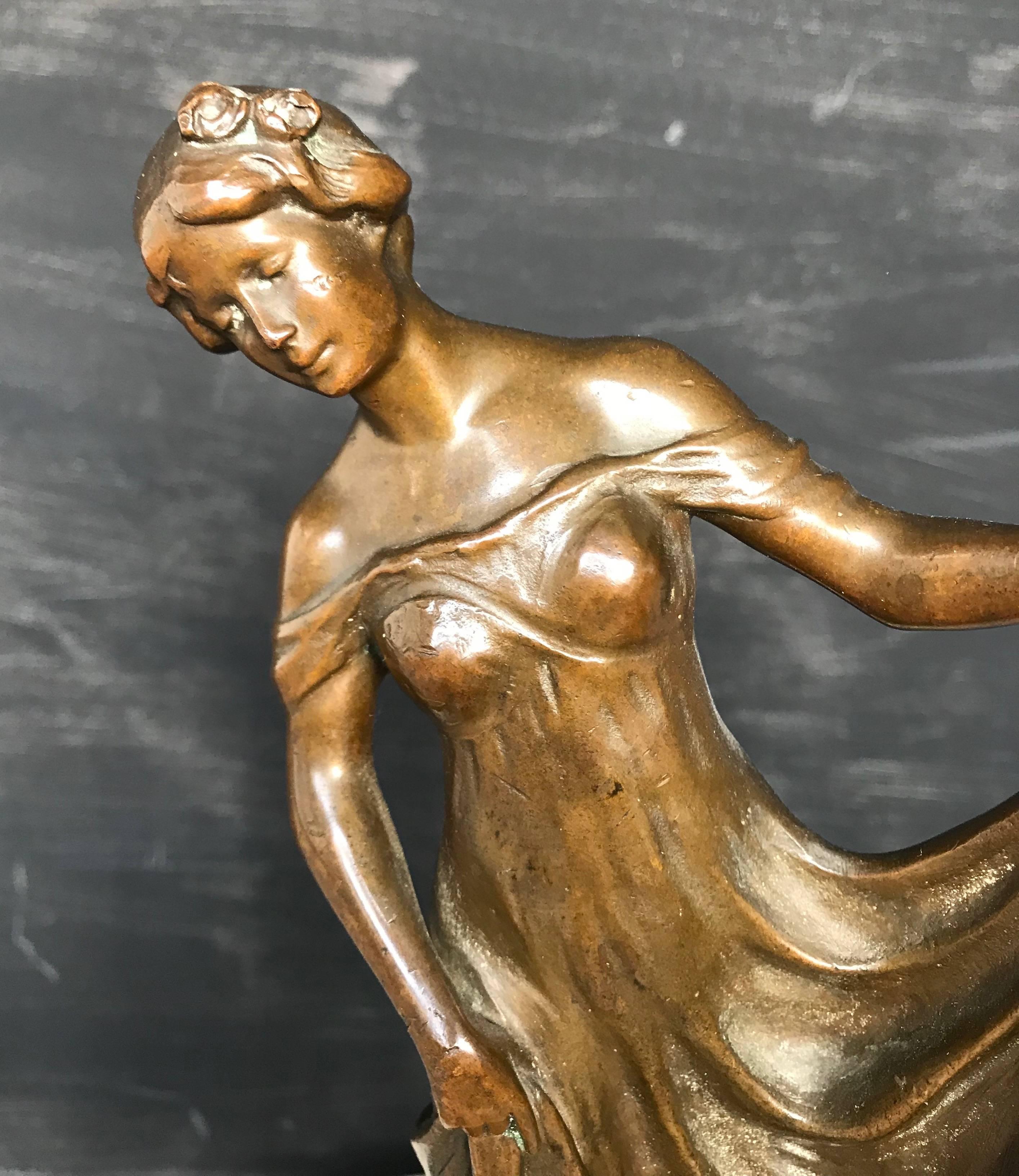 bronze lady figurines