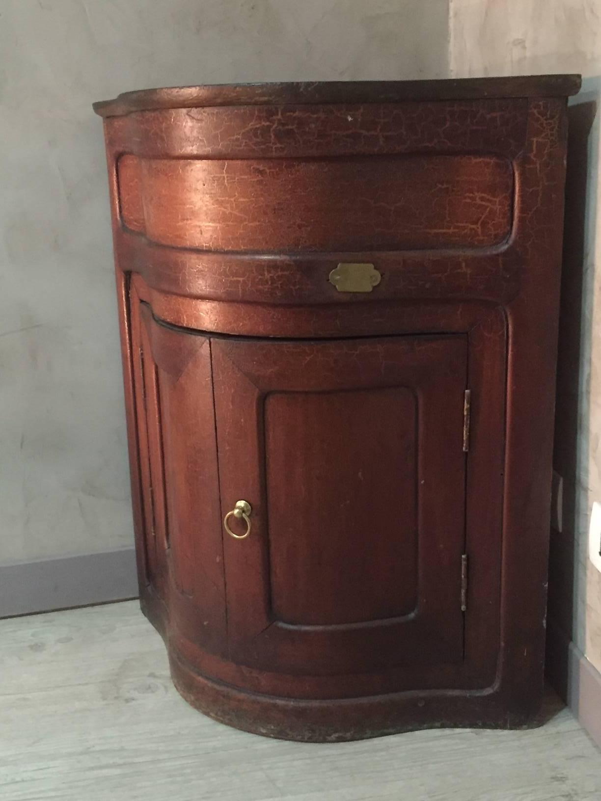 French corner cabinet. It was used in a bathroom. There is a shelf with a hole for the pipes. But the shelf is to restored.