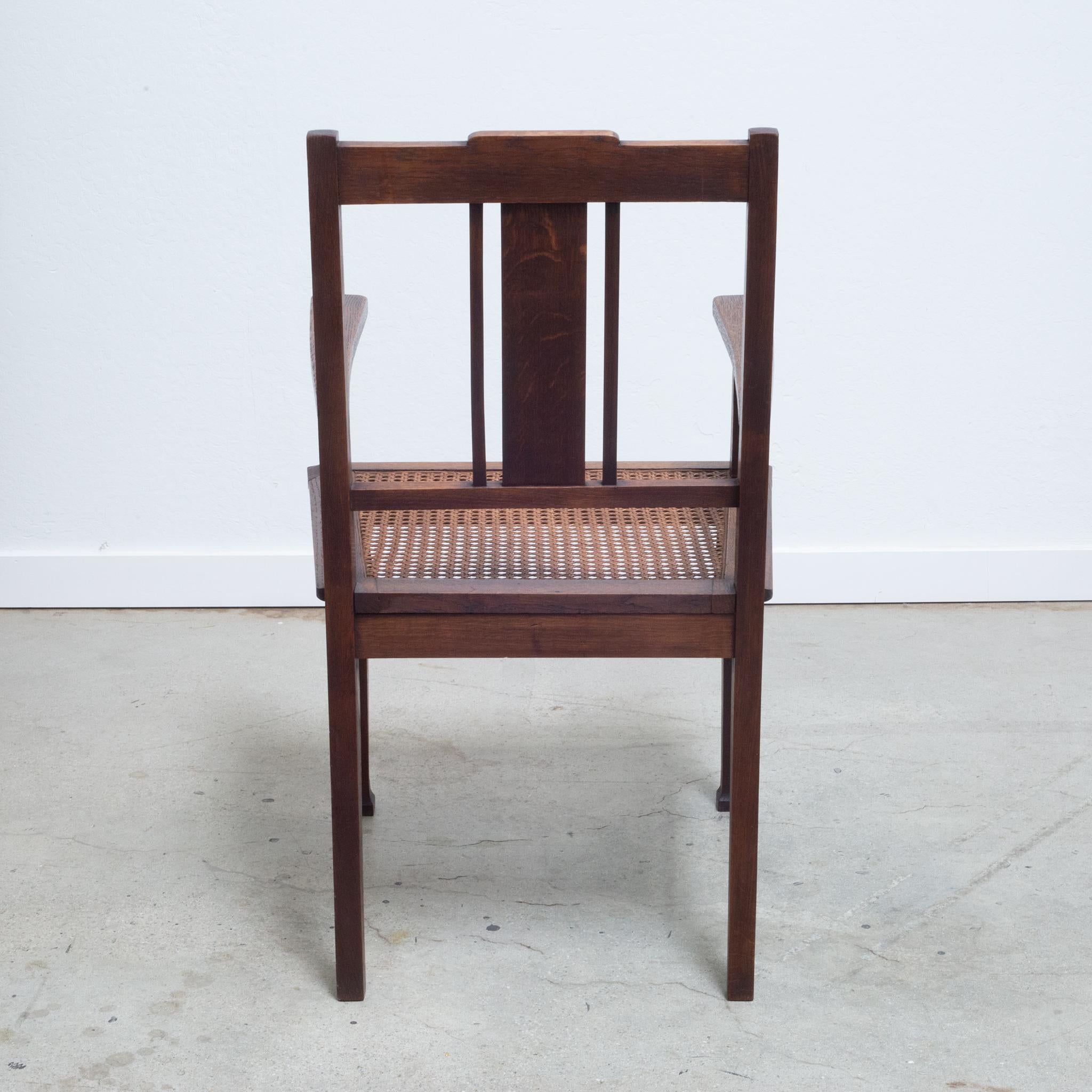 English Early 20th C. Glasgow Style Arts and Crafts Caned Oak Arm Chair, c.1900 For Sale