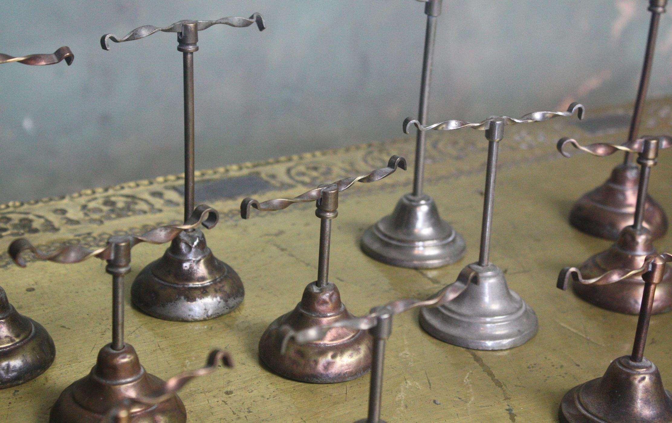 A fine collection of Edwardian shoe stands 

These would of sat upon counter tops and in windows showcasing the latest shoes available to the public

Made from, copper, brass and nickle plate 

Price is for the collection of 16 

4 pairs of