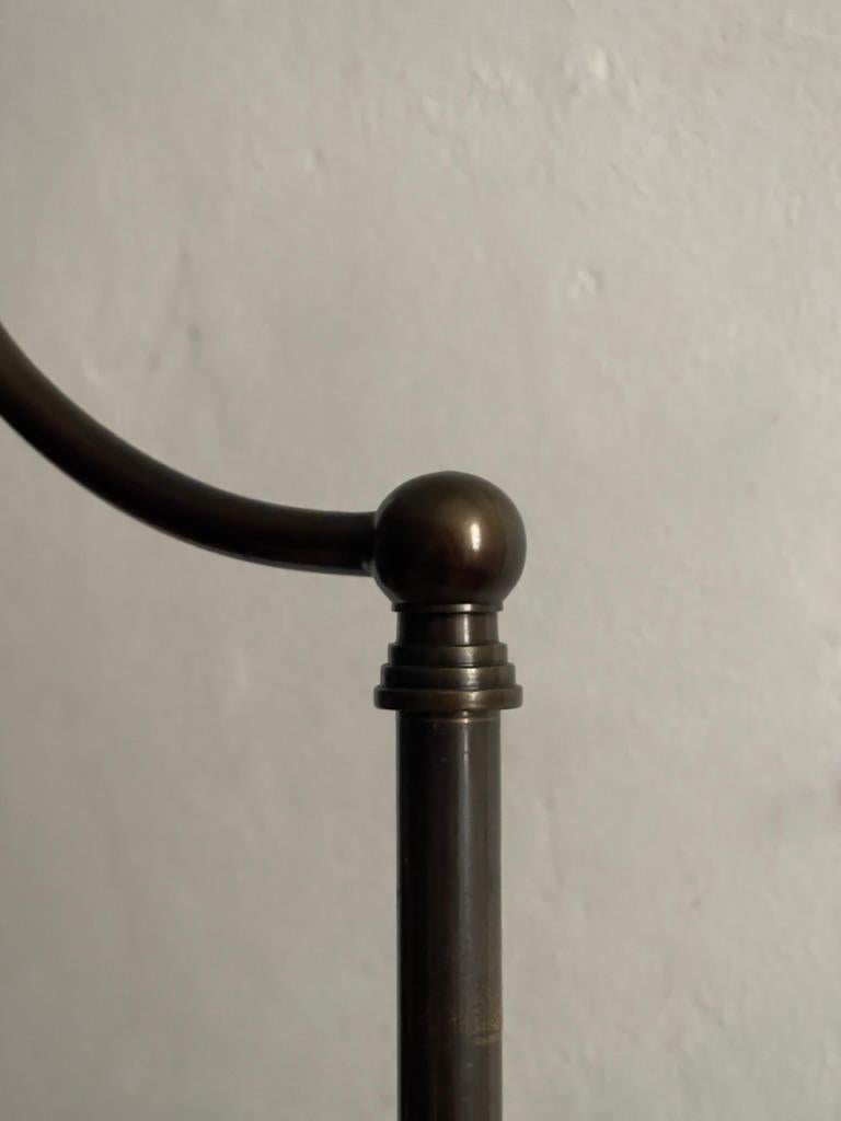 Danish 1920s Scandinavian art deco floor lamp in patinated bronze with new linen shade. For Sale