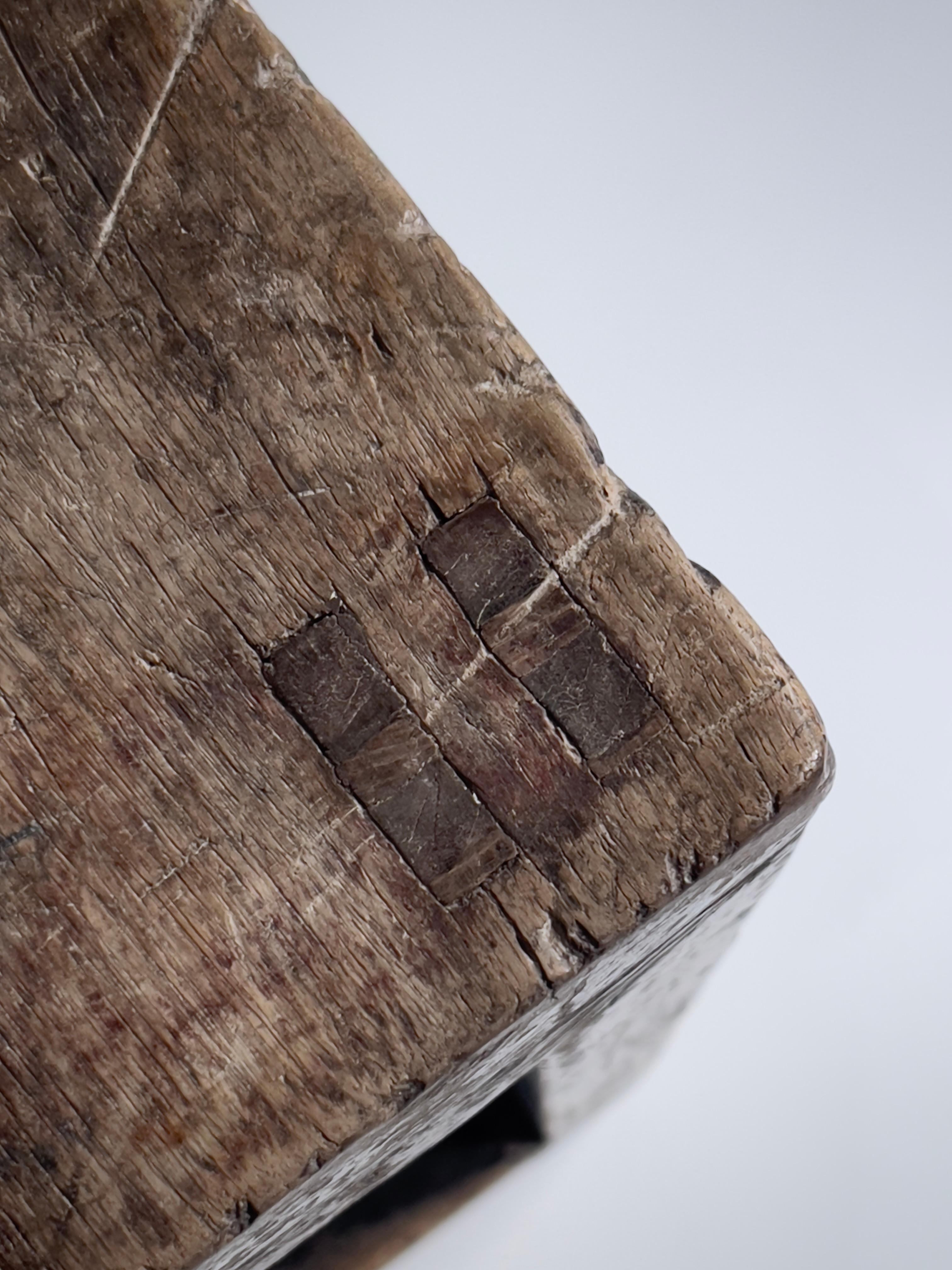 Early 20th European art and craft stool in solid oak and original black