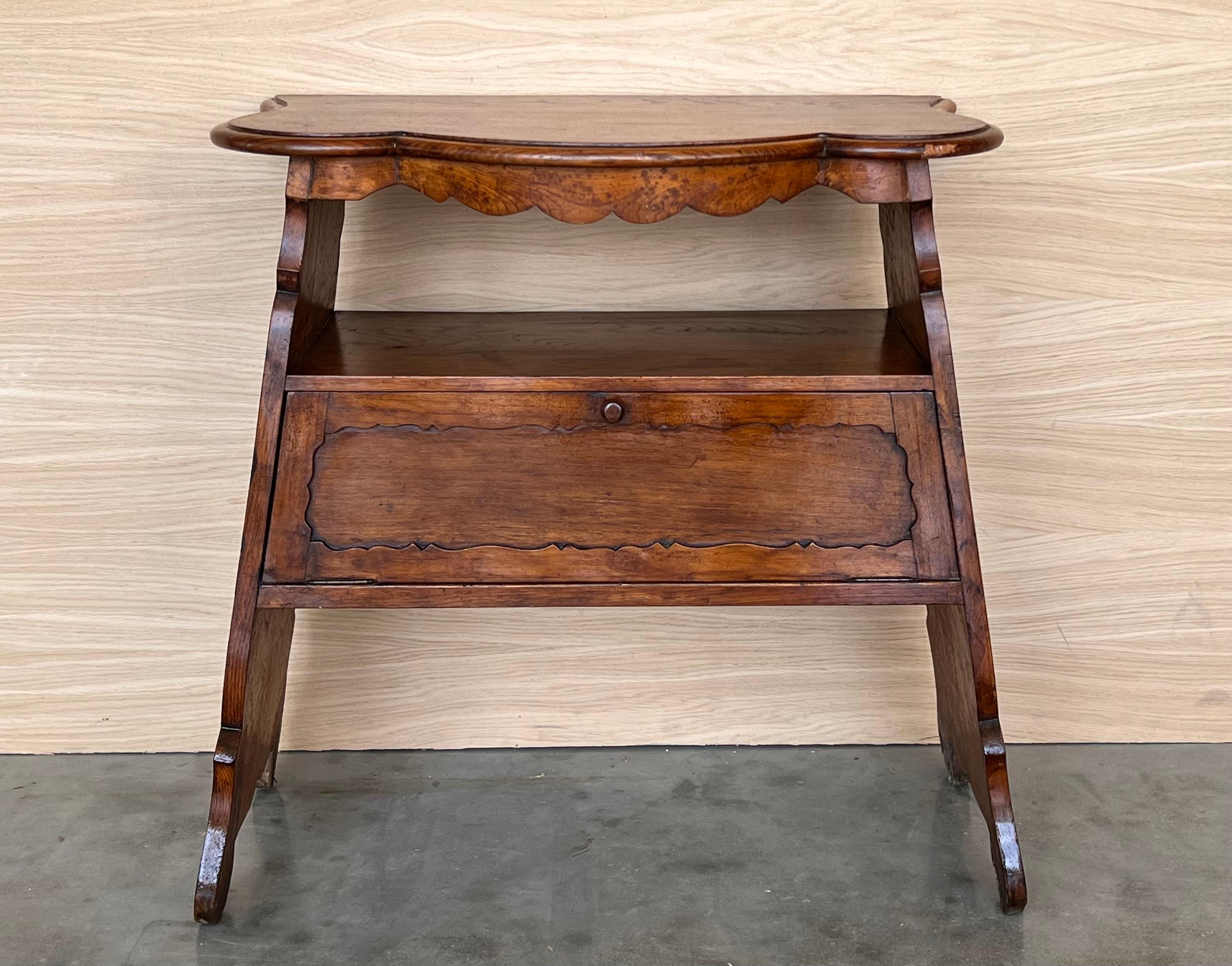 A charming Provincial beautifully aged rich patina.  Hand-crafted of solid red walnut , likely cherry-wood case and a thick walnut slab top with front and side serpentine shaped molded edge, over a rectangular solid wooden case with quality pegged