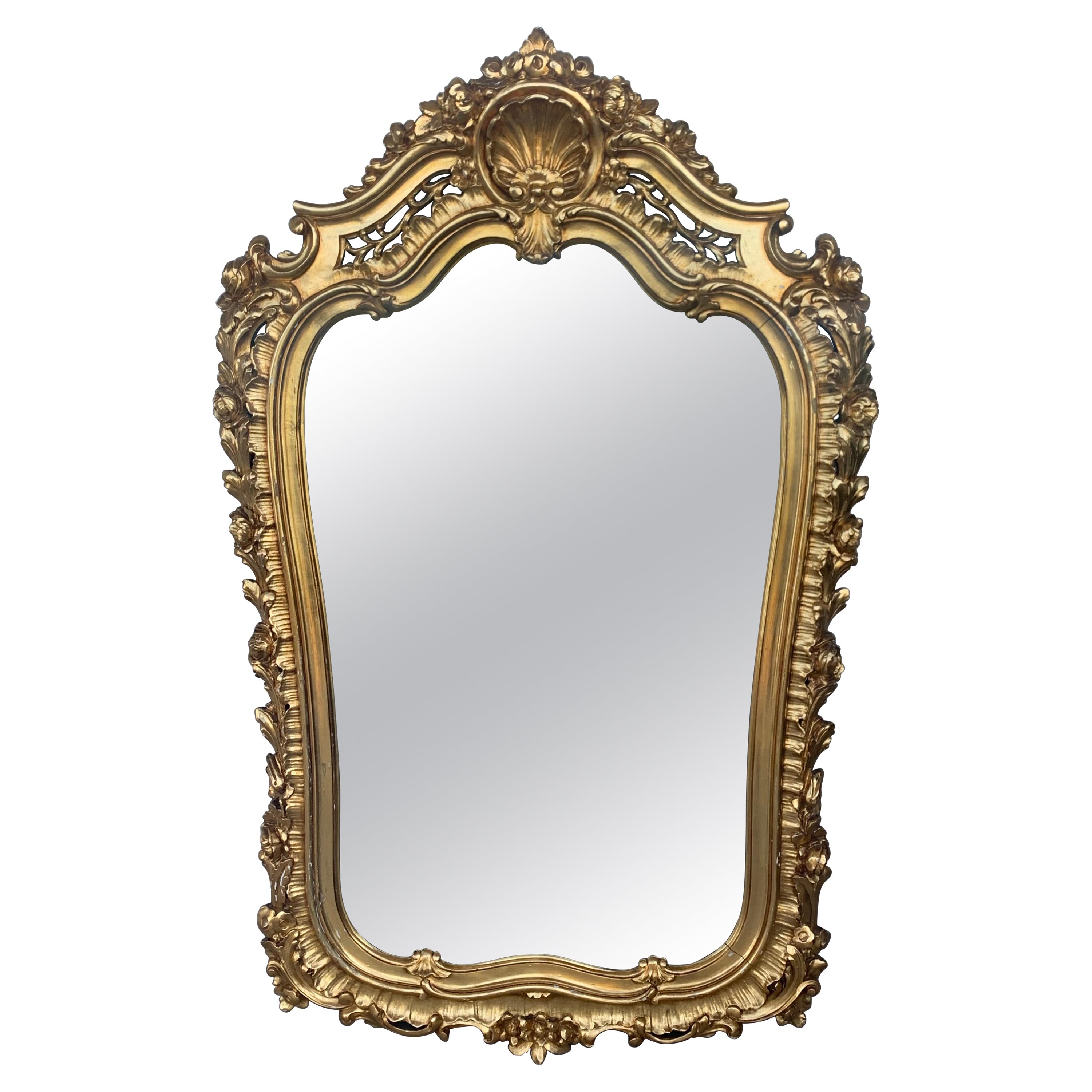 Specchio in legno dorato intagliato del periodo Impero francese dei primi del Novecento