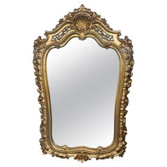 Miroir en bois doré sculpté du début du 20e siècle de la période de l'Empire français