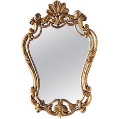 Specchio in legno dorato intagliato del periodo Impero francese dei primi del Novecento