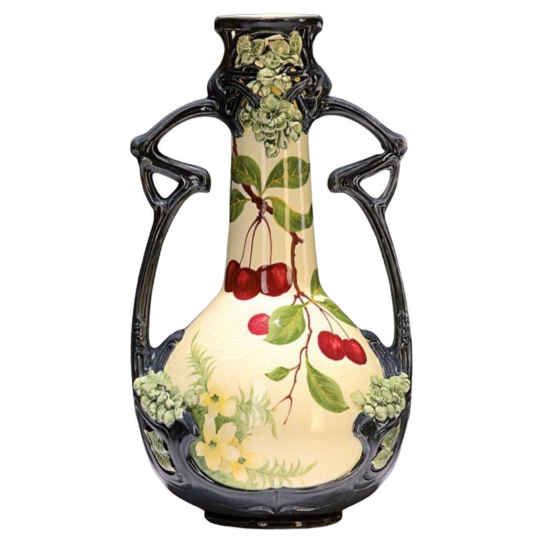 Early 20th German Art Nouveau  with cherry decoration handled Vase.  For Sale