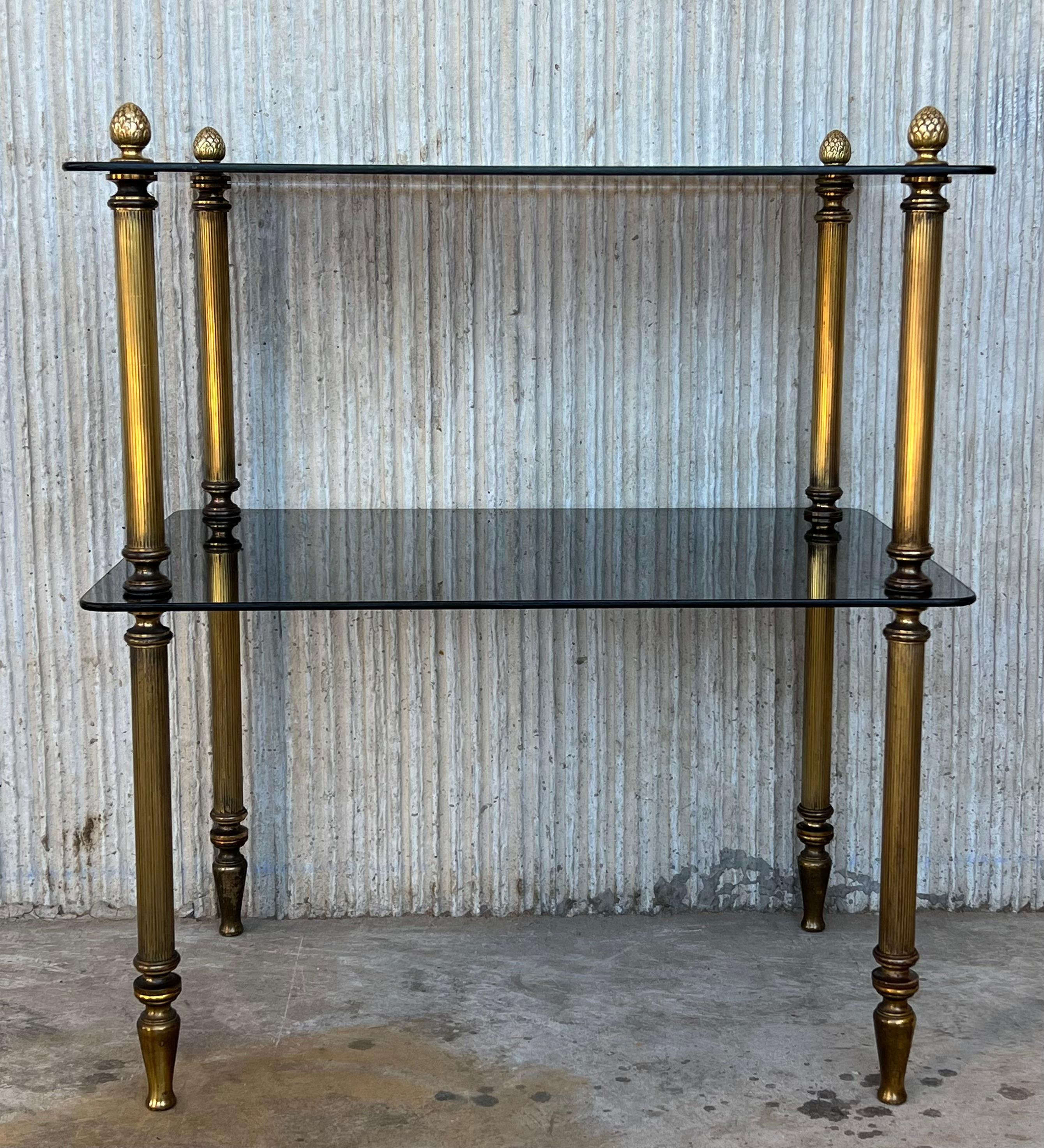 A fine and elegant bronze frame with ribbed columnar legs and shaped tops and legs, with ball finials and peg feet. 
Smoked glasses.
The bronze with a nice patina. 
 