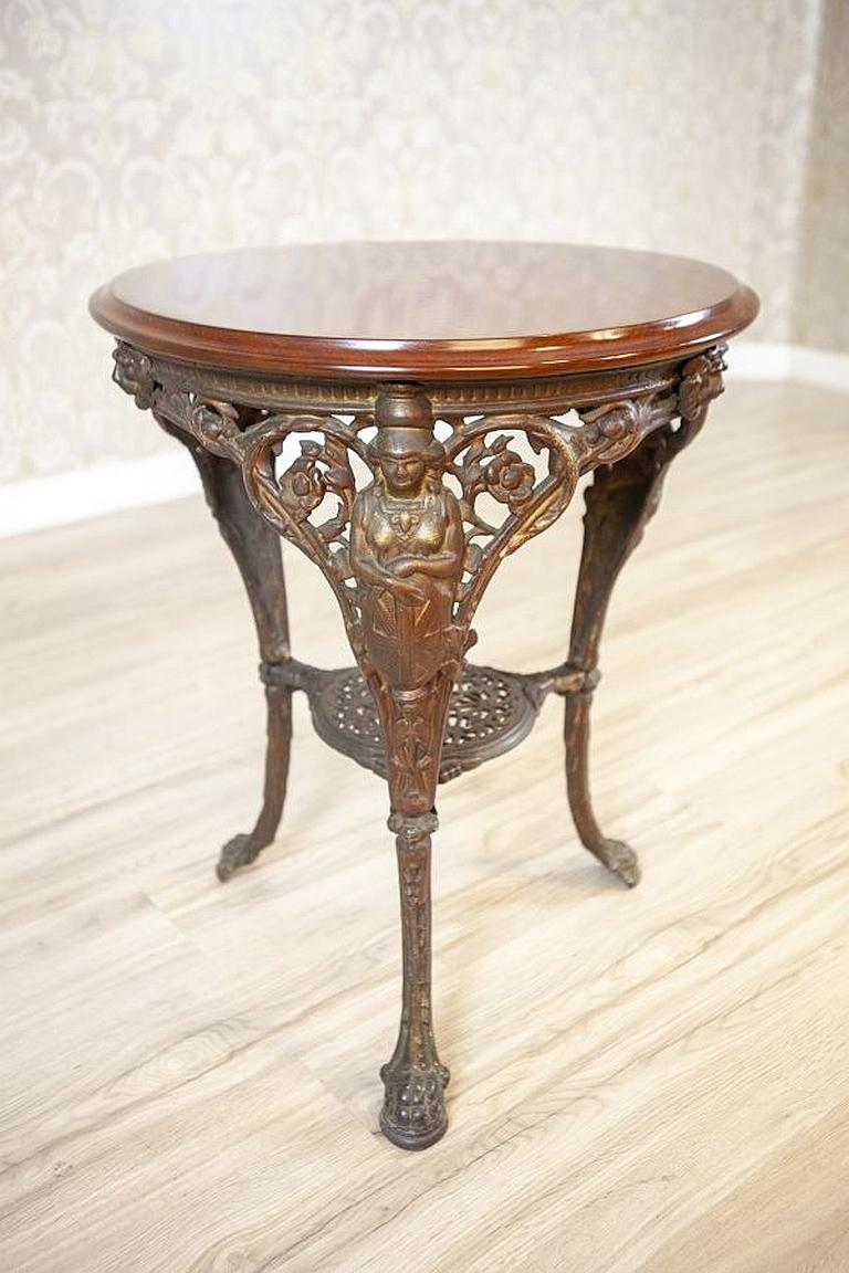 European Early-20th Oval Coffee Table on Cast Iron Base For Sale