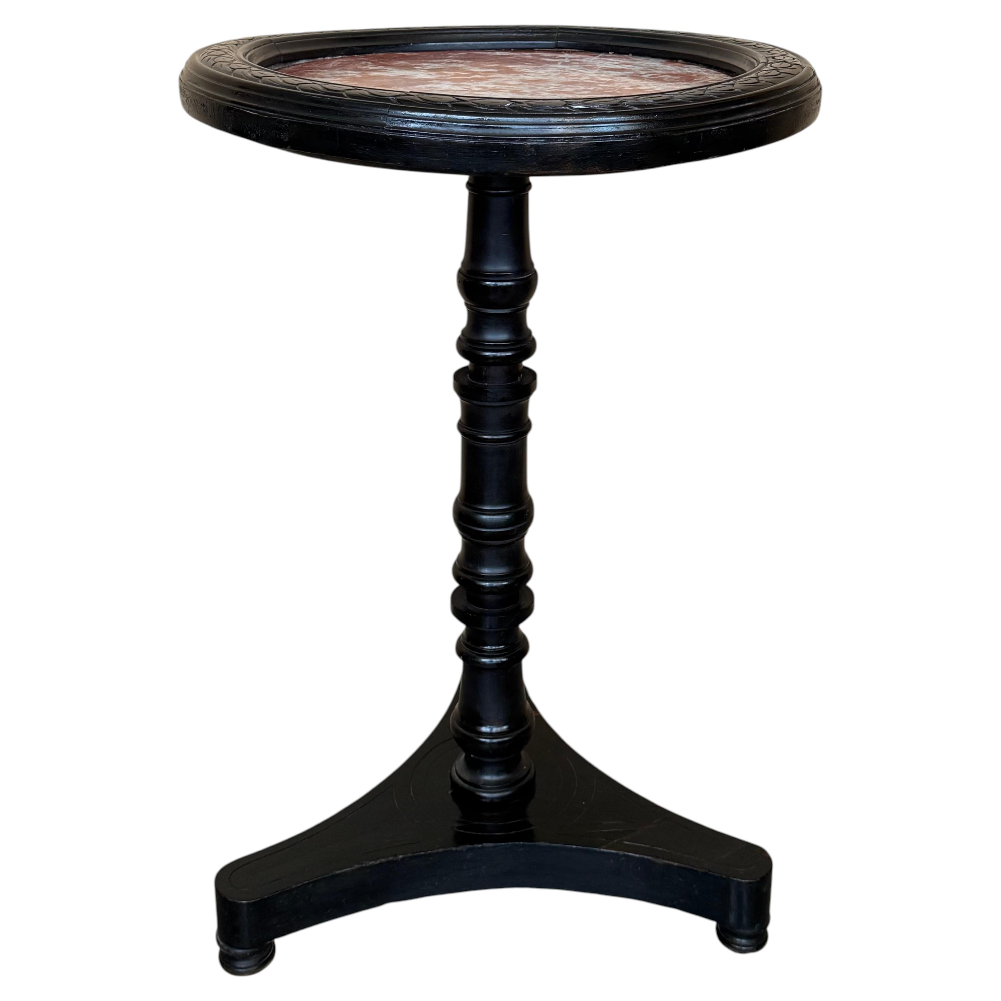 Early 20th Round Pedestal Table in Black Ebonized Walnut with Pink Marble Top For Sale