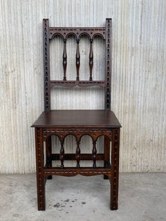 Early 20th Set of Four Spanish Carved Chairs with Wood Seat