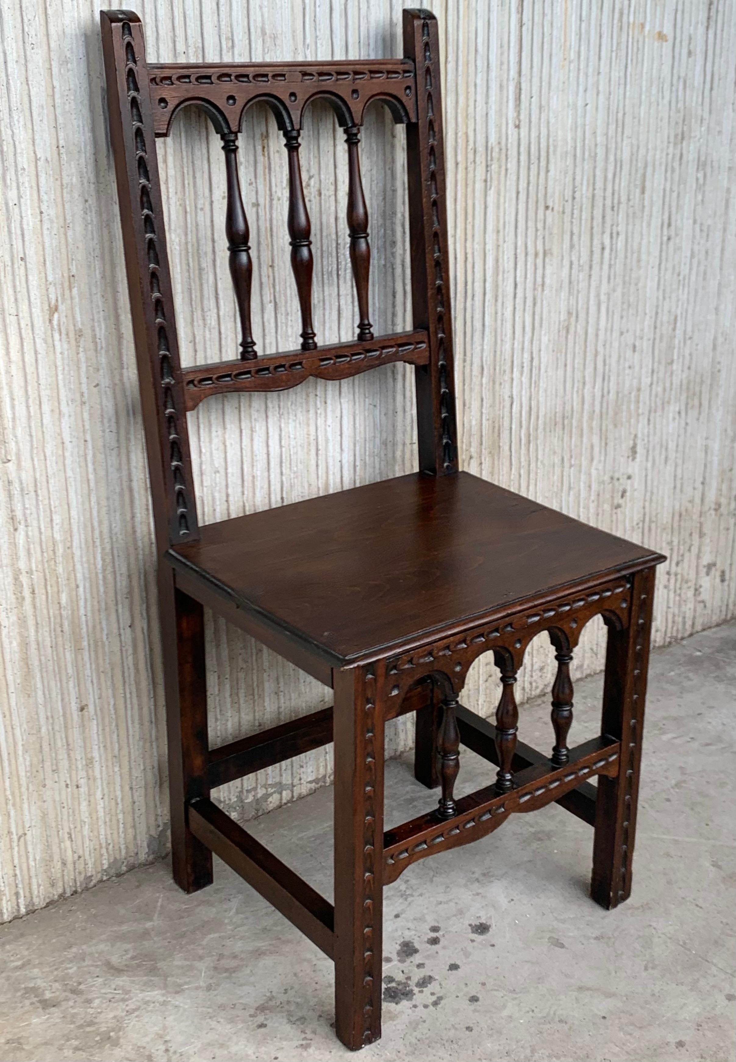 Early 20th Set of Four Spanish Carved Chairs with Wood Seat In Good Condition For Sale In Miami, FL