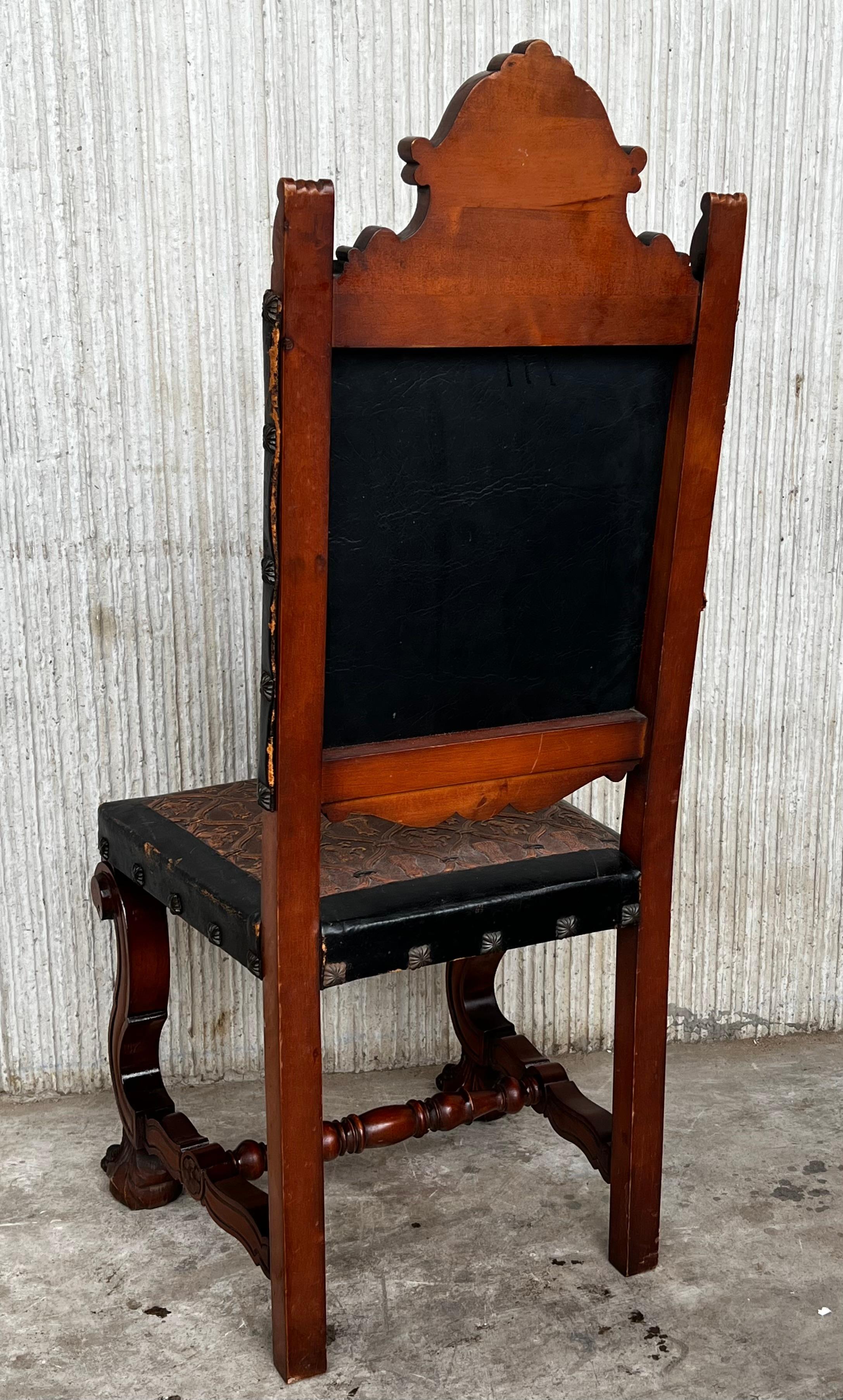 Spanish Colonial Early 20th Set of Six Spanish Carved Chairs with Black & Brown Embossed Leather  For Sale