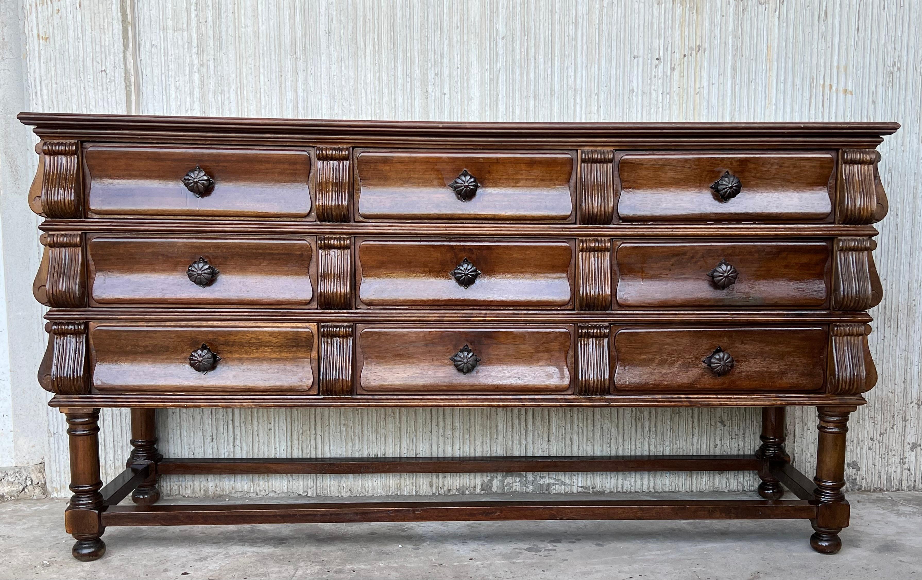 A museum quality, Spanish, Late-Renaissance, cedar enclosed chest of drawers with exceptional walnut in architectural or façade front This is the most sophisticated Spanish model of chest of drawers conceived as a cabinet piece with an architectural