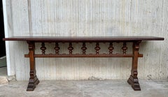 Tavolo da console spagnolo dei primi del Novecento con due gambe a piedistallo unite