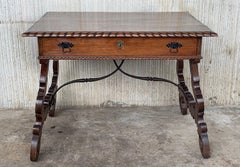 Early 20th Spanish Desk with Lyre Legs and Carved Edges on Top