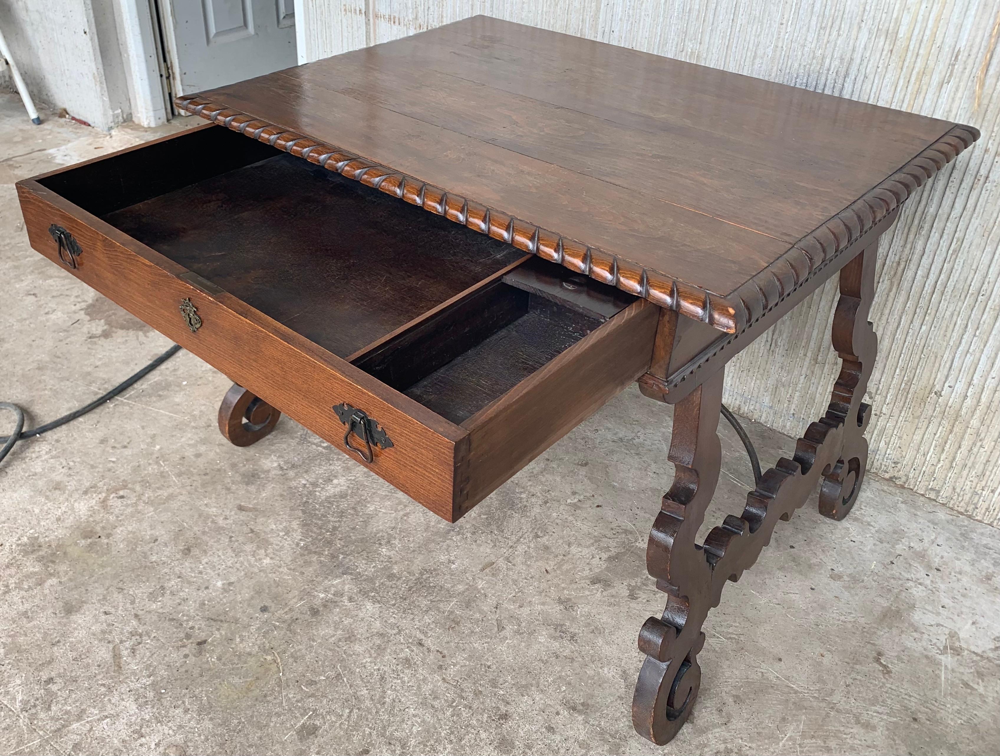 Wrought Iron Early 20th Spanish Desk with Lyre Legs and Carved Edges on Top For Sale