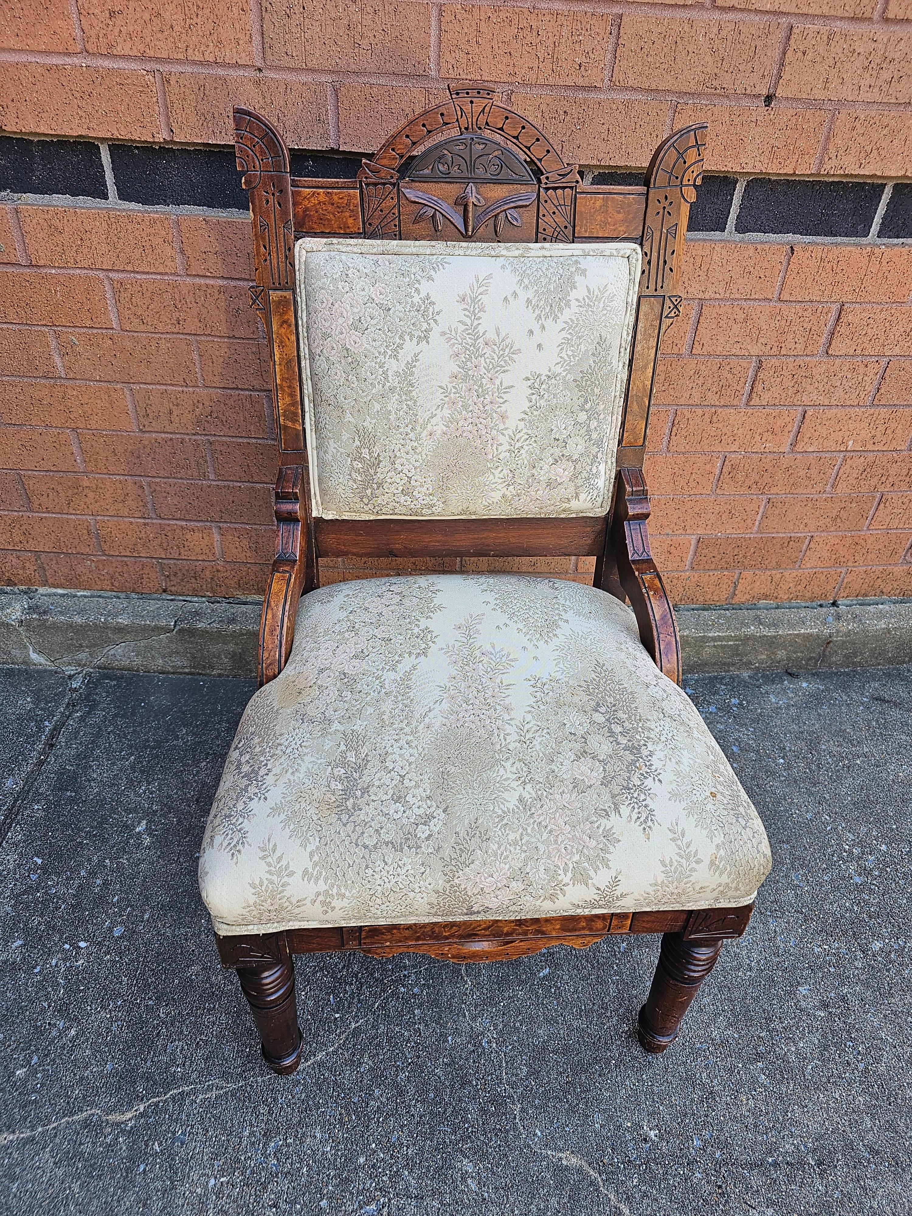 An Early 20th Victorian Carved Walnut and Upholstered Side Chair measuring 20