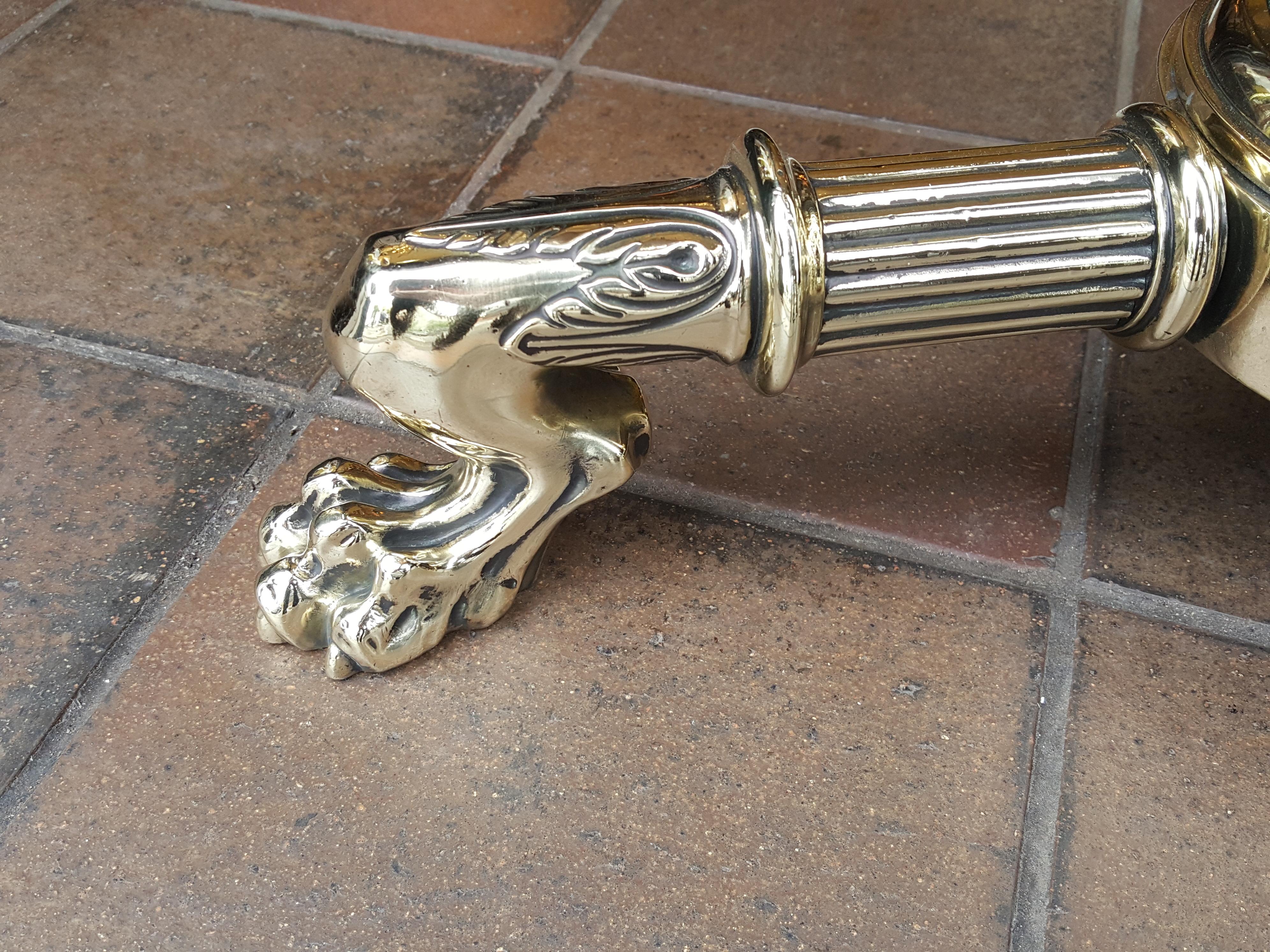 Early 20th century brass standard oil lamp, telescopic column, gadrooned 'font', triform base, lion paw feet - 22
