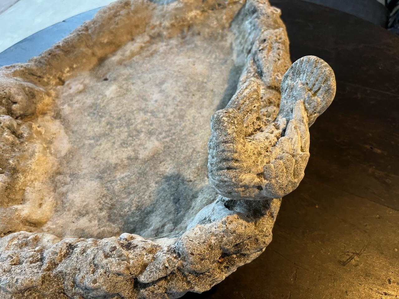 1930s cement bird bath. This may be used as a bowl. This is very heavy and has a great presence being out doors. Can be used in the center of a garden,