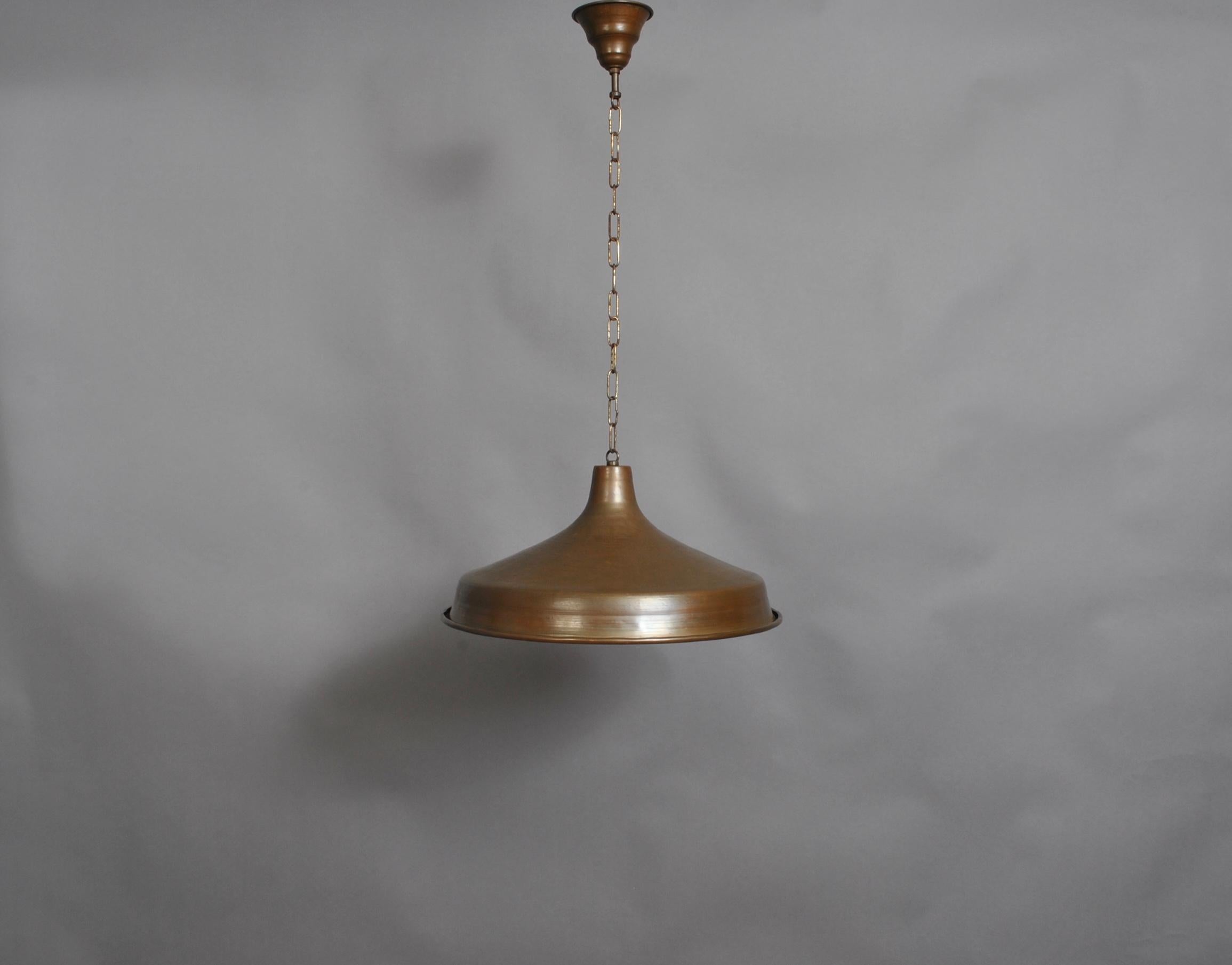 A large Danish copper pendant light. From the early to mid part of the 20th century. Wonderful aged patina, but could be polished to a high sheen. A longer/shorter hanging chain can be added if required.
Rewired.