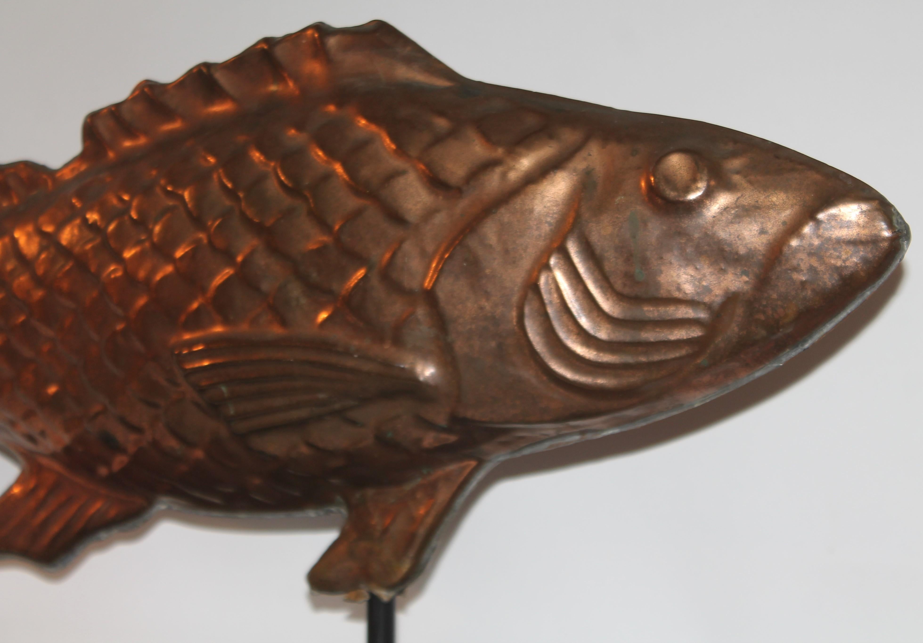 copper fish sculpture