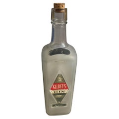 https://a.1stdibscdn.com/early-20thc-gin-bottle-from-a-bar-for-sale/f_7971/f_318888221671745173938/f_31888822_1671745174549_bg_processed.jpg?width=240