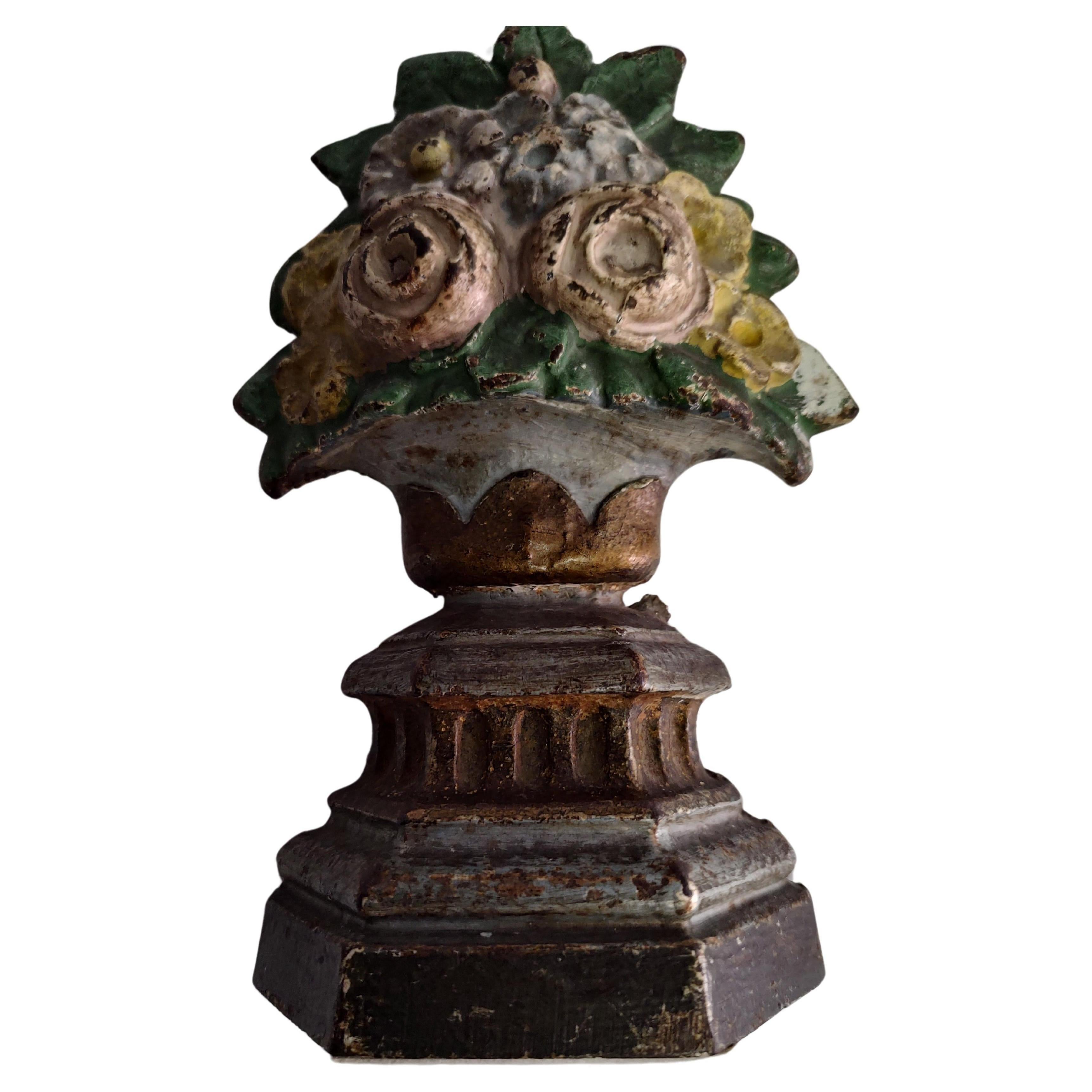 Antique cast iron Doorstops by Hubley in original paint. No breaks or cracks in excellent vintage condition with minimal wear to the paint. Flowers in a red basket, flowers in a urn. Priced and sold individually. Recently purchased a collection so a
