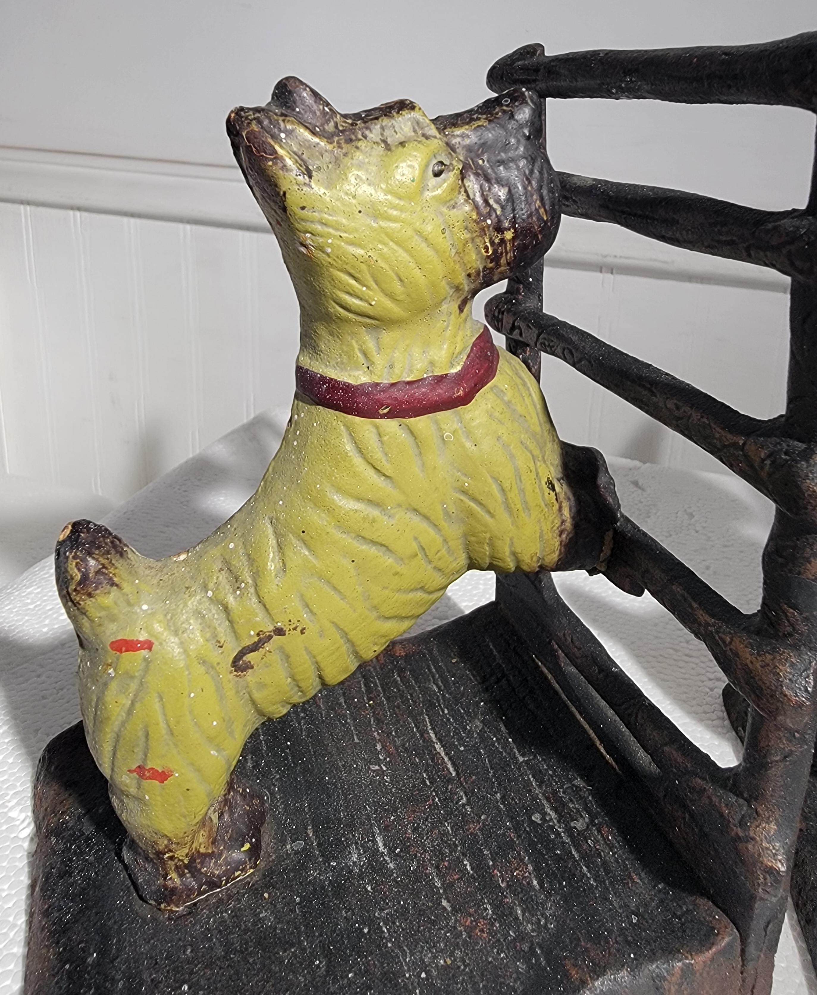 This fine pair of original Scottie dogs iron bookends on a fence are in fine undisturbed surface.This pair of fun bookends are quite heavy and in fine condition.