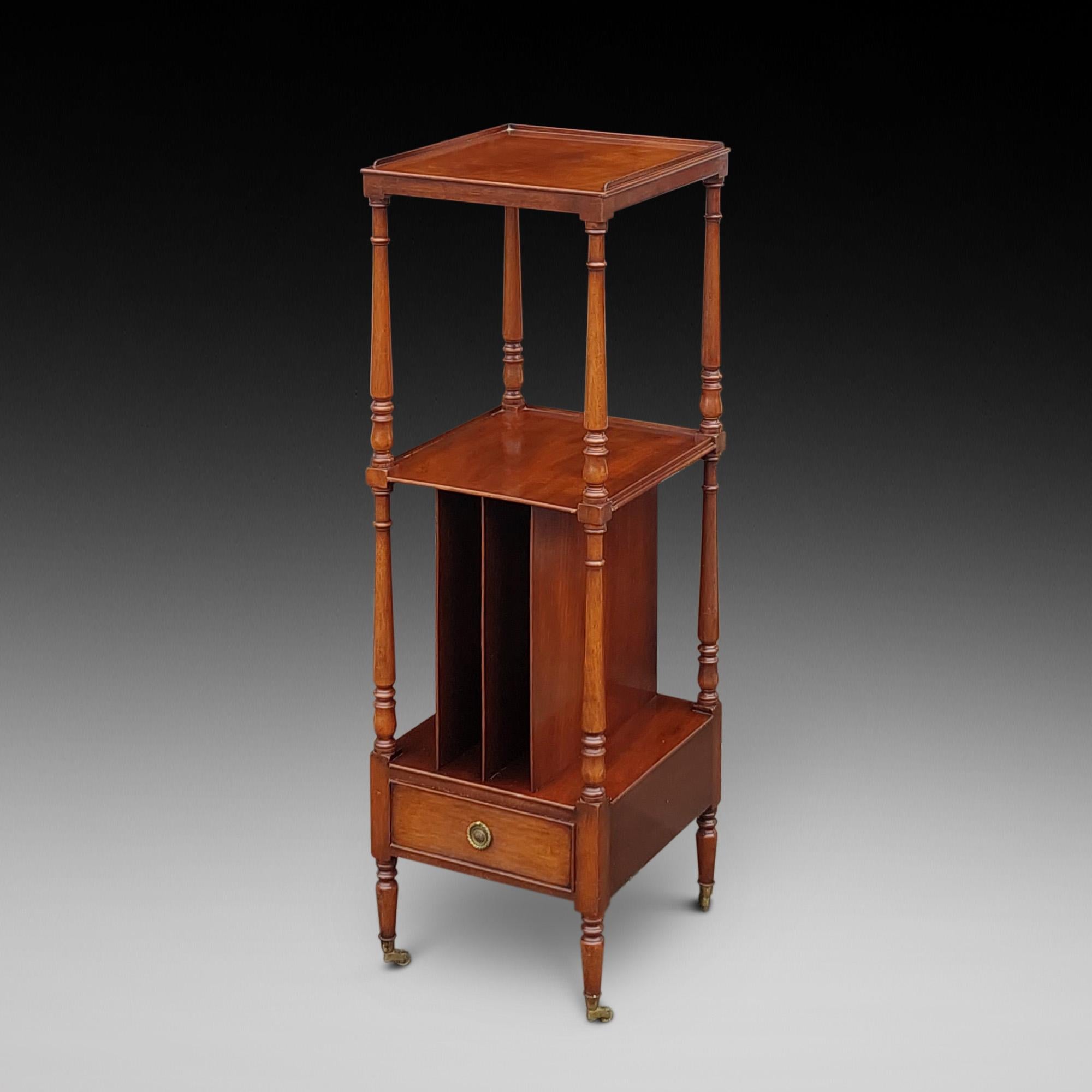 Early 20thC Mahogany Three Tier Whatnot Stand - a magazine rack above the lower tier and a drawer below, the legs on brass caster feet - 13