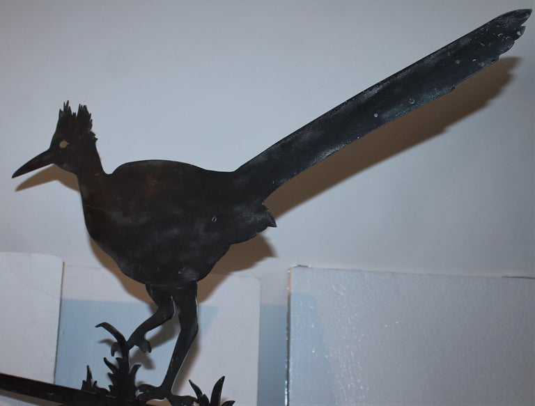 This fantastic folky road runner weather vane is mounted and has the original directionals . The condition is very good and has a nice mellow patina. Great south west look.