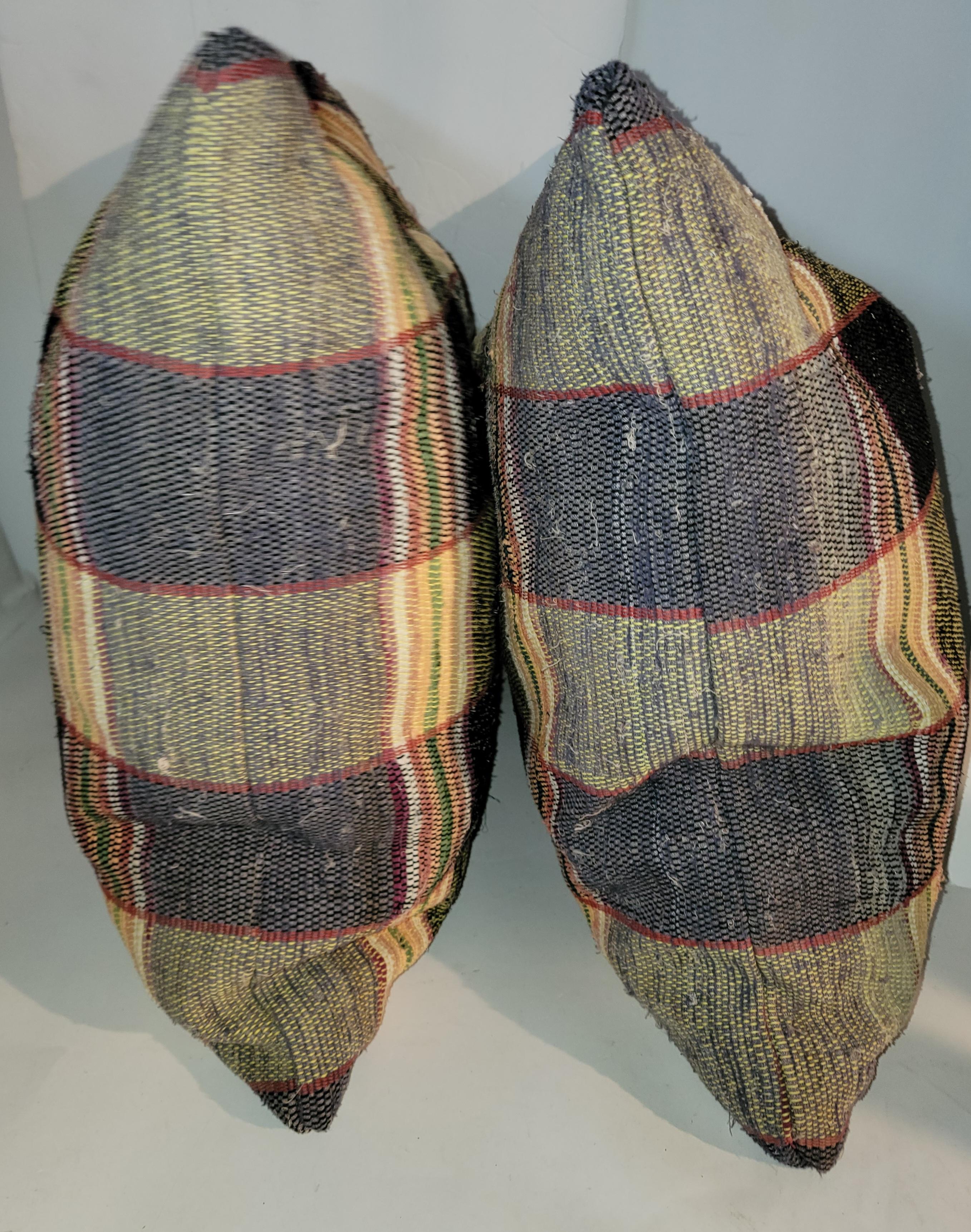 Early 20thc pair of RagRug pillows from New England.