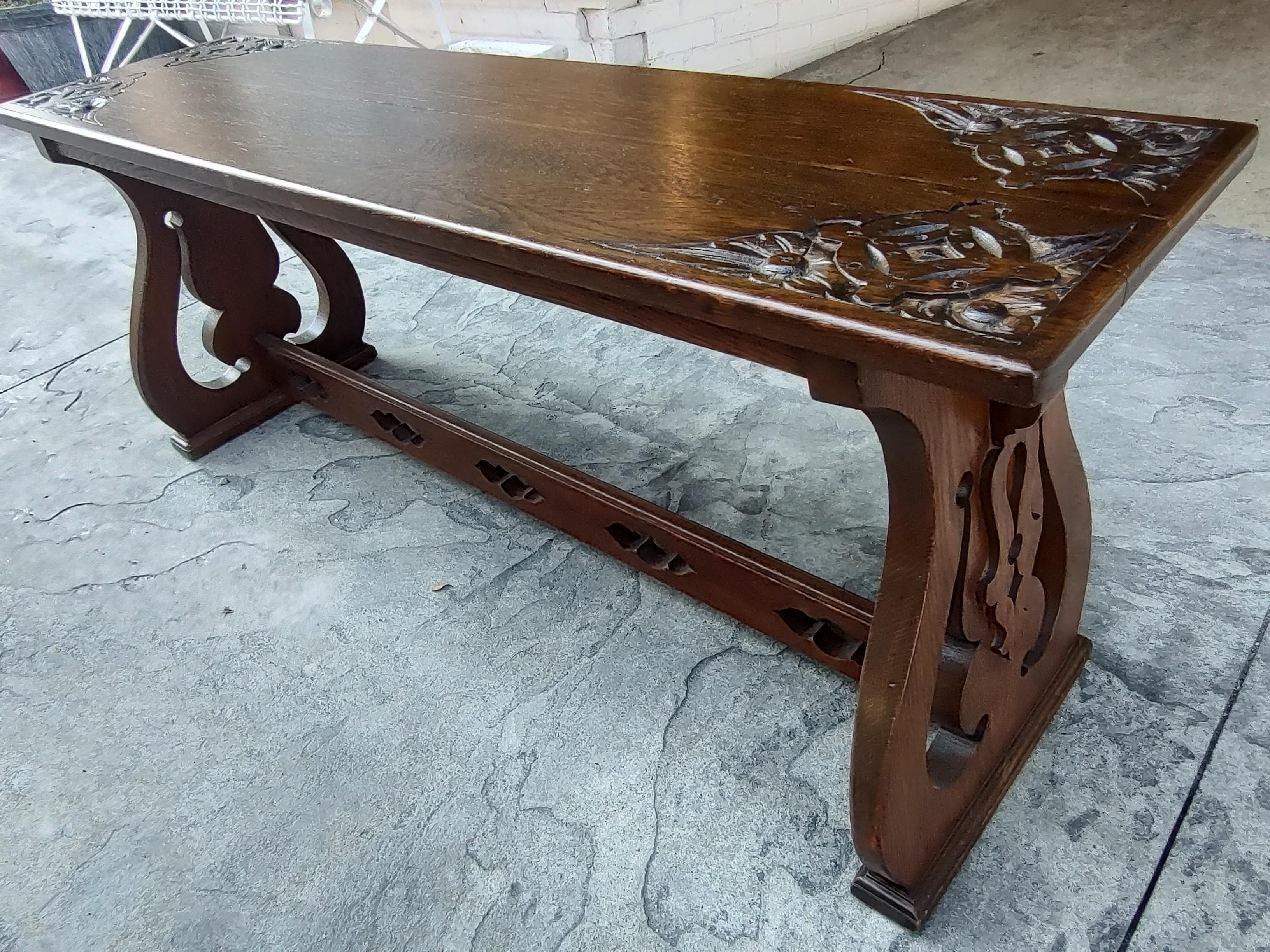 Simple and elegant oak Altar bench from about 1910. Hand carved Christian Symbolism on top ends. In excellent antique condition with minimal wear. Just refinished. Measures: 48 x 13.