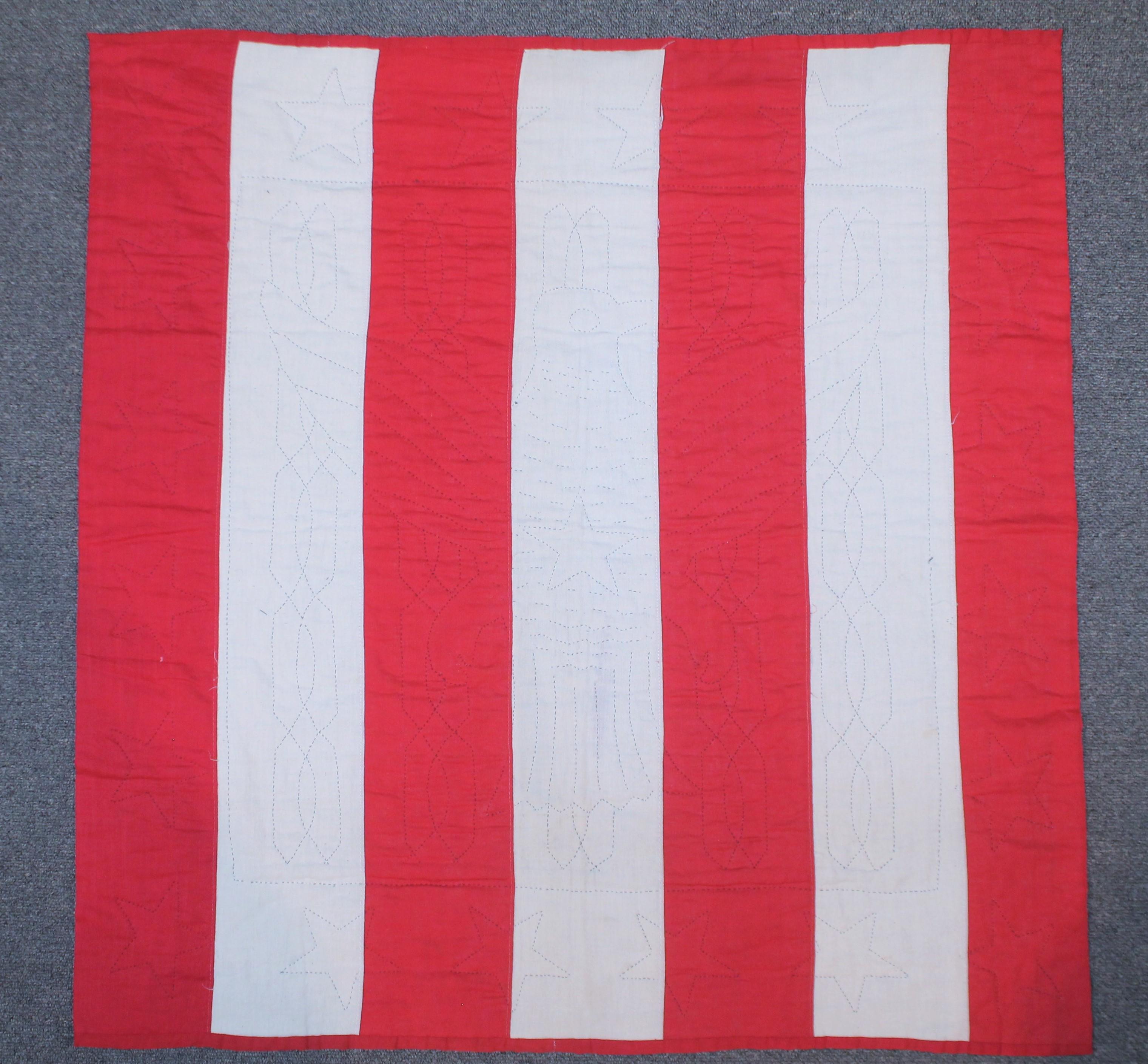 This great patriotic quilt is made from 19th century flag fabric. We believe this to be made in the earlier part of the 20th century. This is a great quilt and in great form. Very rare and amazing condition.