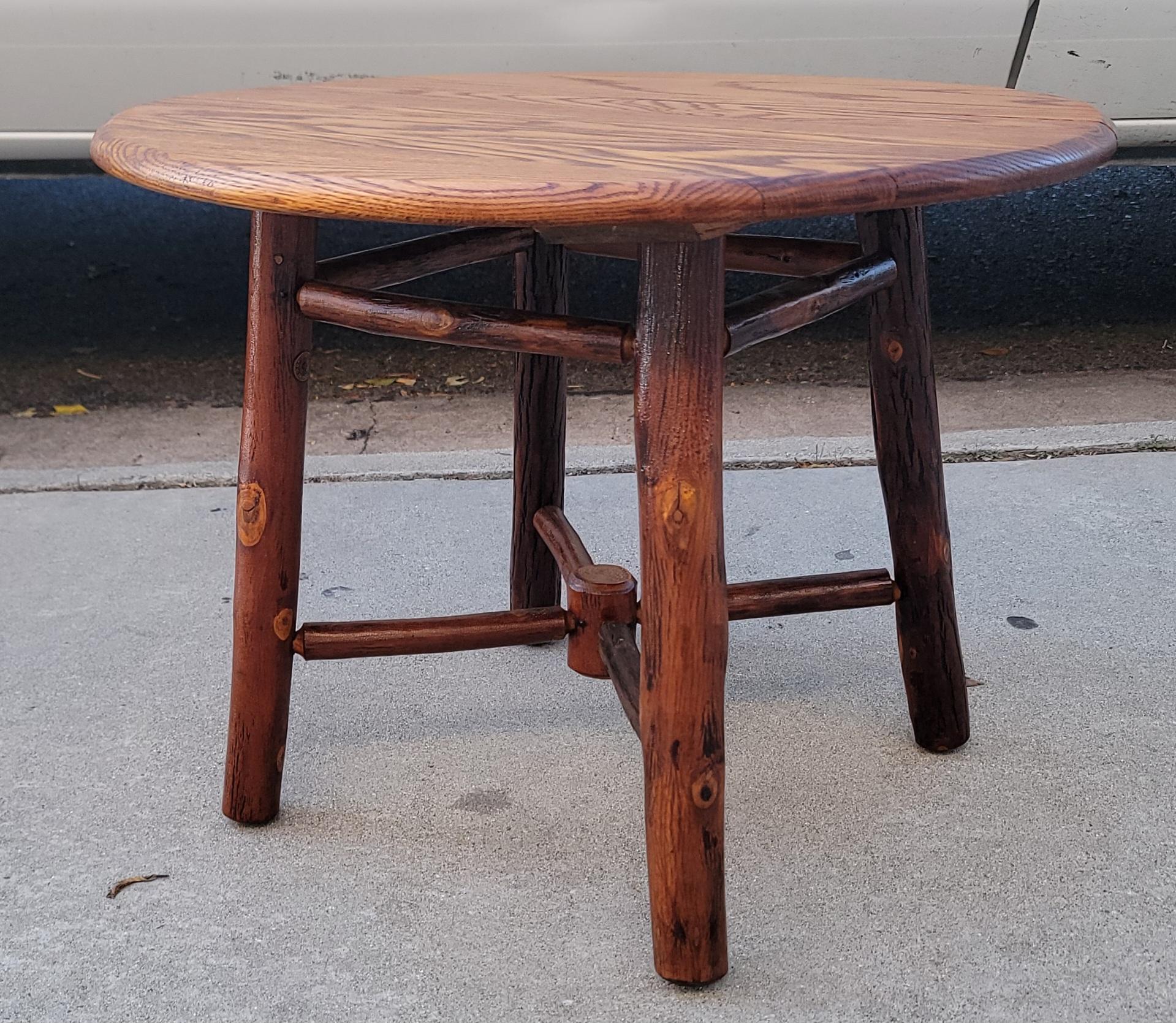 1930's Signed Old Hickory side table from Martinsville,Indiana in pristine condition. This table has a fine patina.