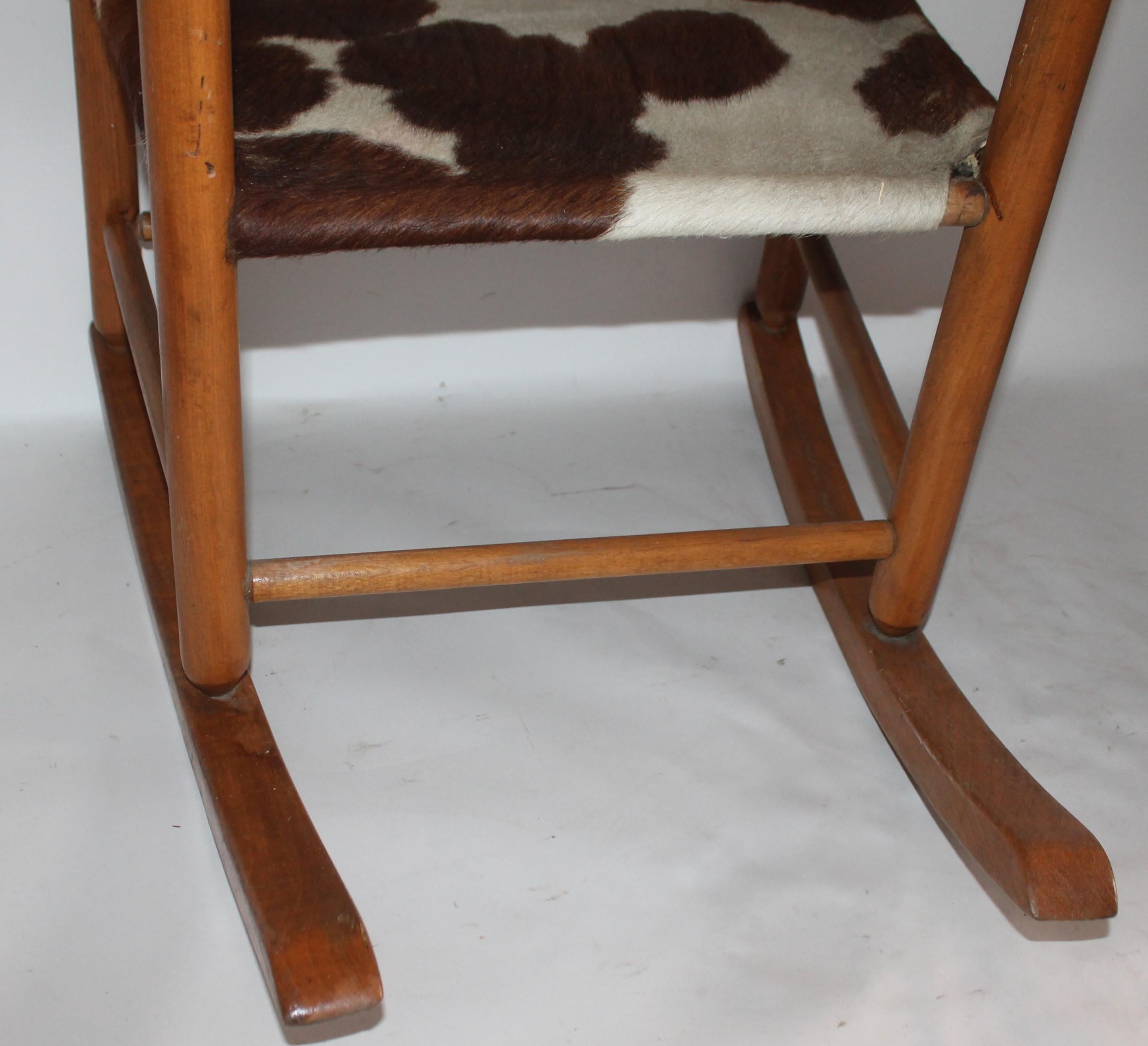Wood Early 20th Century South West Rocking Chair in Cowhide Seat