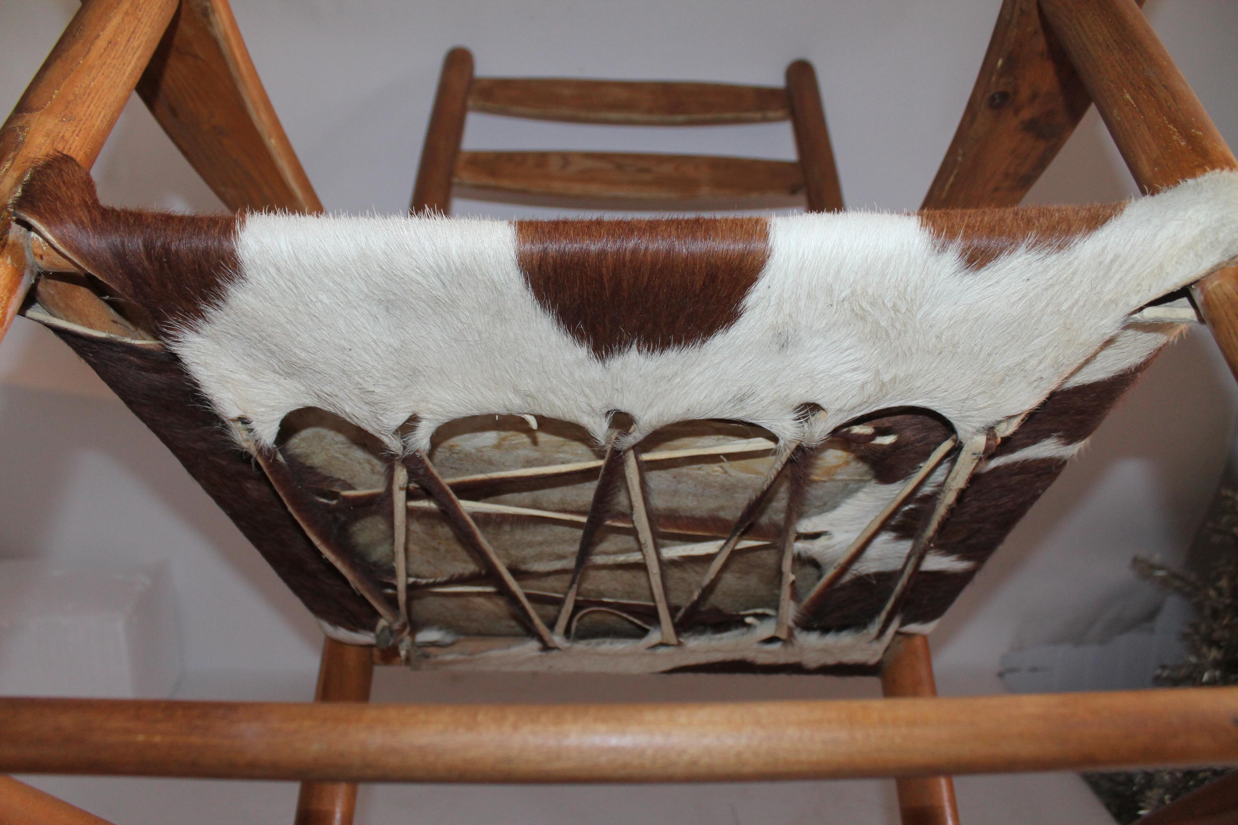 Early 20th Century South West Rocking Chair in Cowhide Seat 1