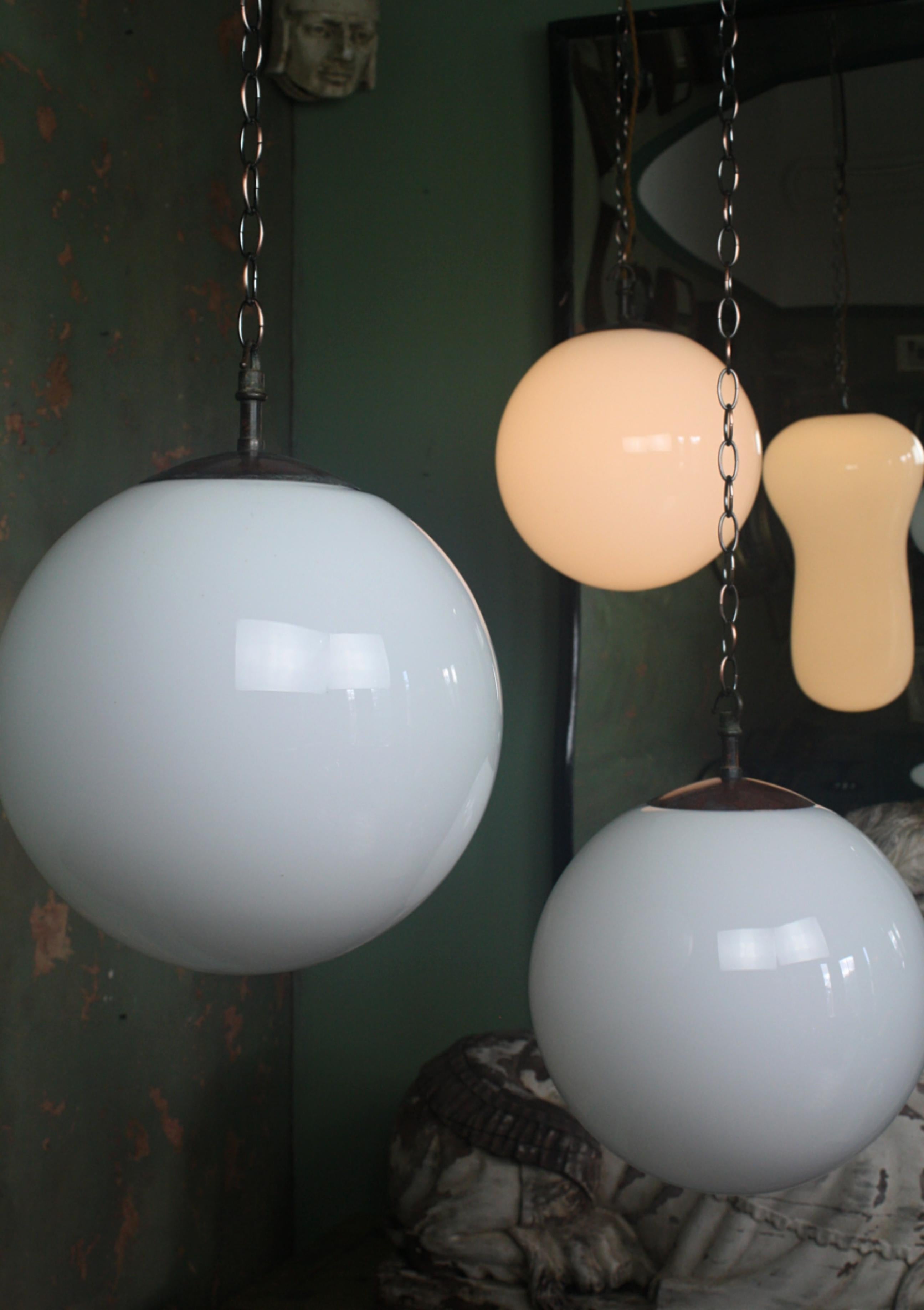 Mid-Century Modern Early 20th Century Trio of Opaline Milk Glass and Copper Globes Lights Lanterns