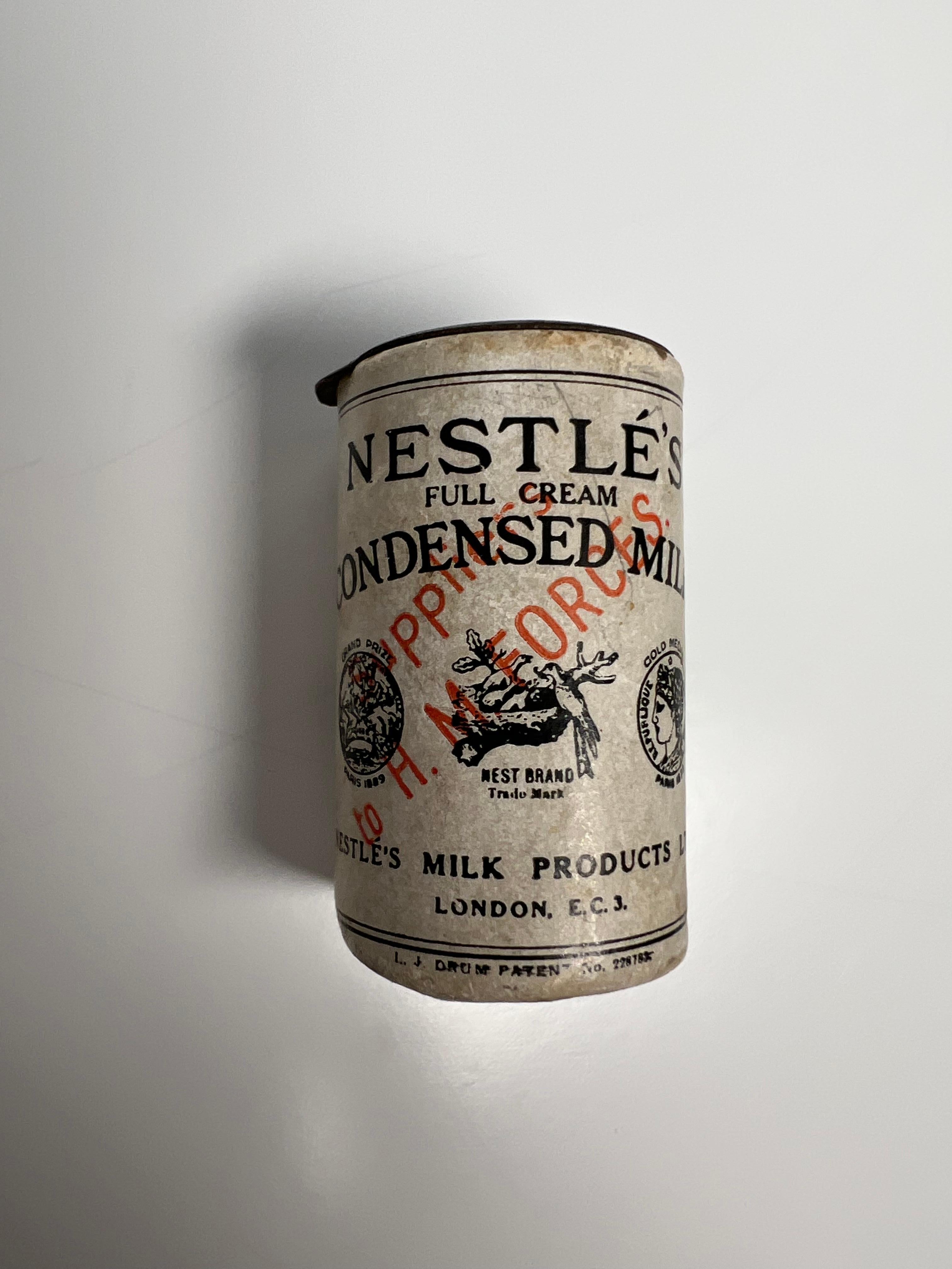 antique condensed milk container