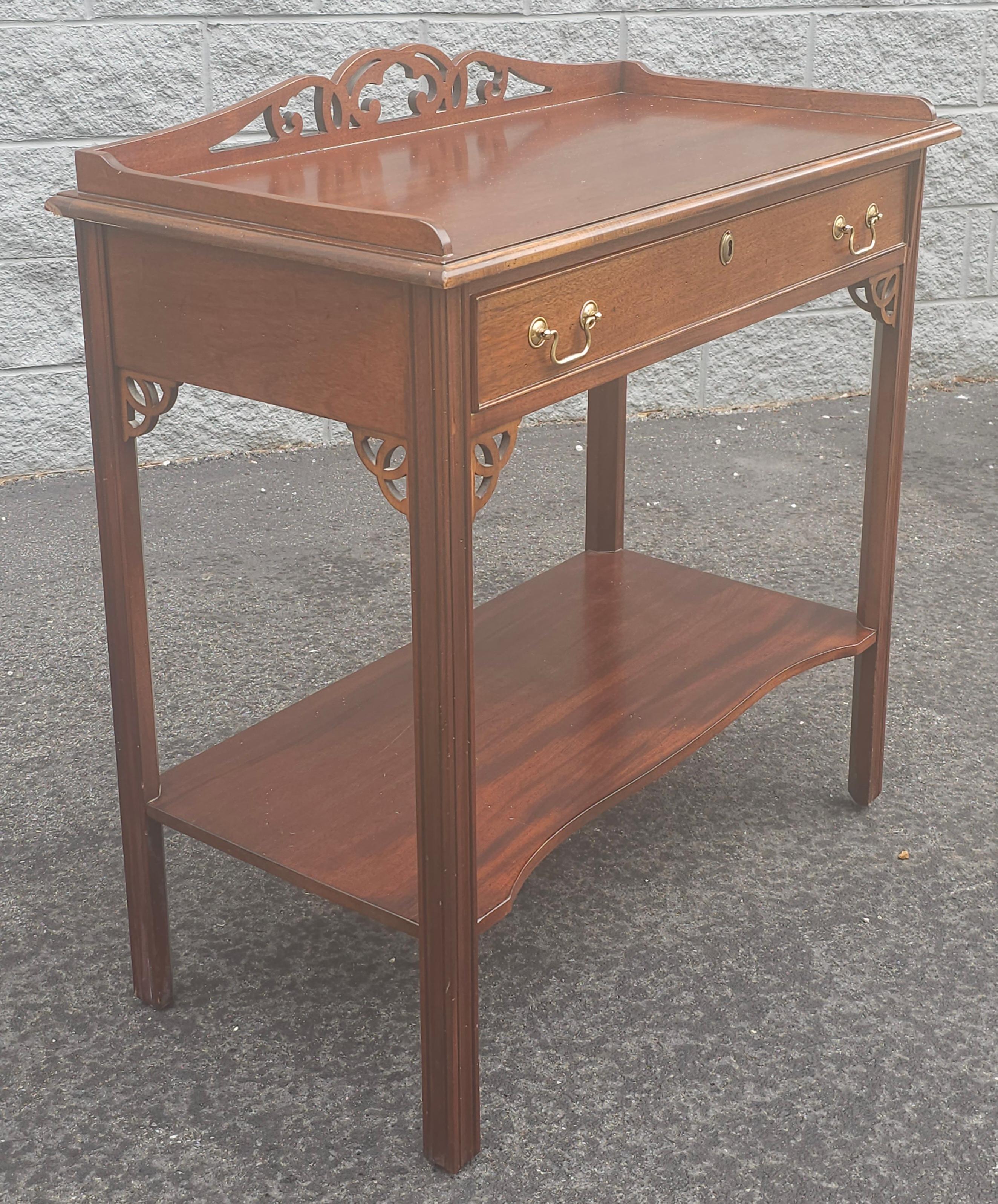 An Early 21st Century Chippendale Mahogany Buffet Server  or  Drybar. Measures 36