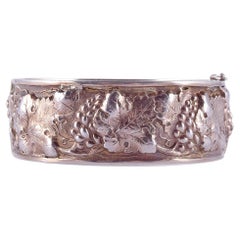 Early 21st Century Grape Vine Motif Sterling Silver Hinged Bangle Bracelet