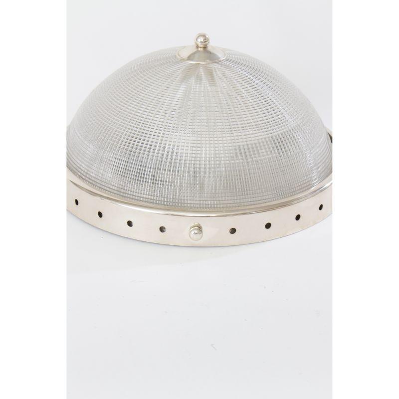 A prismatic holophane flush mount fixture, perfect for low ceilings with only 8” clearance needed! Would be delightful in a bathroom, kitchen or entry way. 12” Diameter. Clean styling with an almost nautical ring, would fit in nicely with