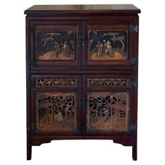 Early 20th Century Chinese Deep Relief Walnut Cabinet