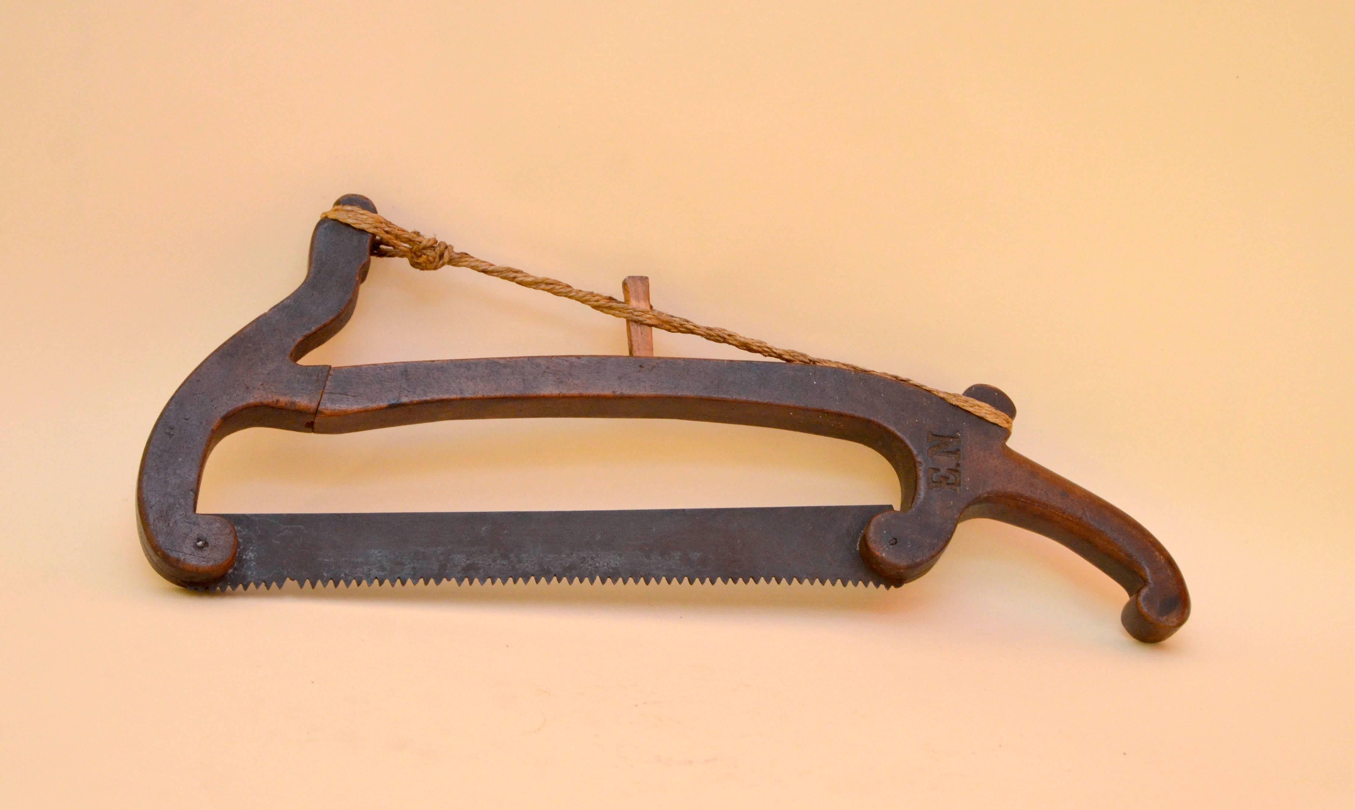 Early '800 very well preserved traditional hacksaw for wine harvest. This exceptional tool with an amazing patina, made in fruitwood, was created in Tuscany, the Italian region famed for its wineries.

It's possible to read on the side of the